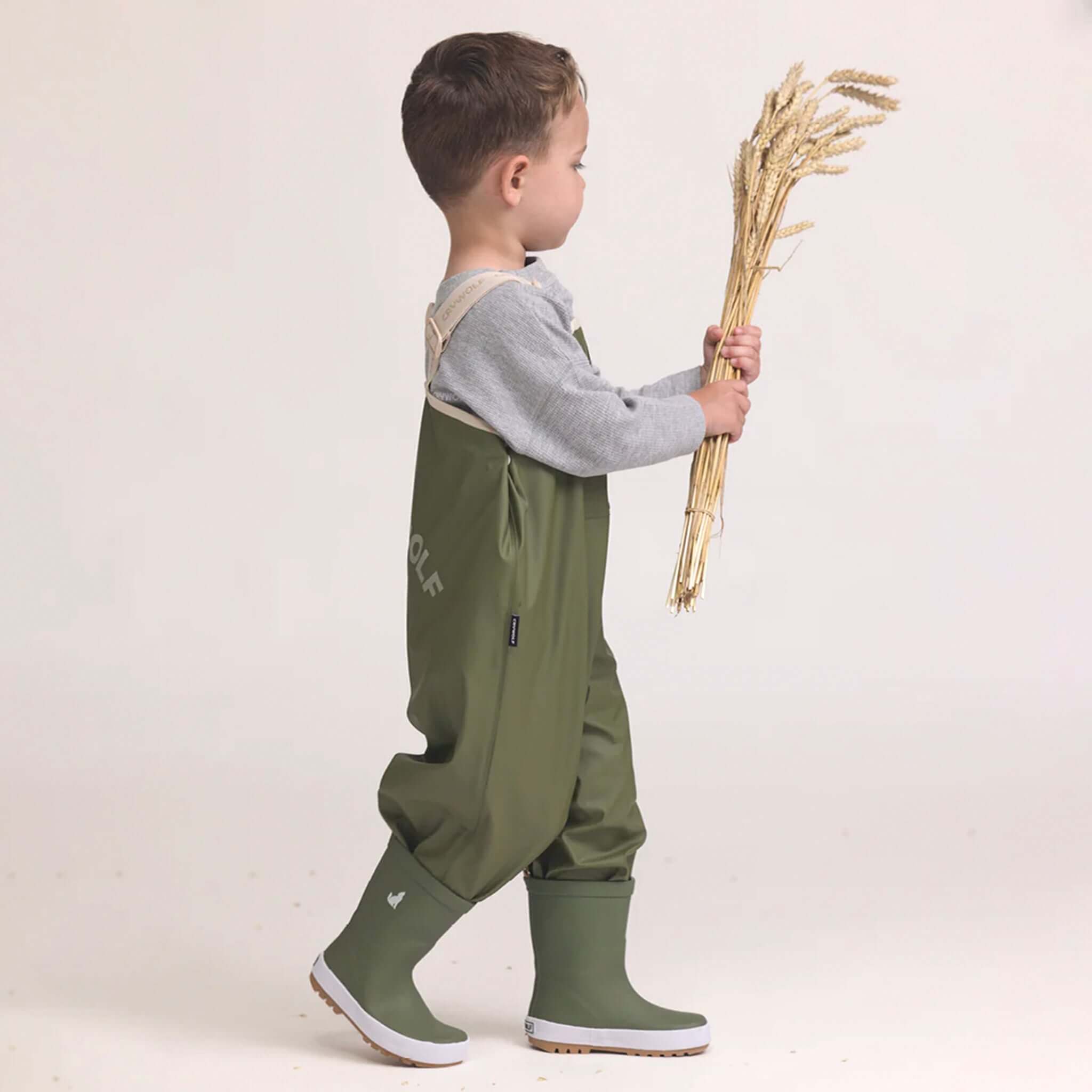Alt Tag: Crywolf Rain Overalls - Olive waterproof kids adjustable rain bib overalls for outdoor play, kindy and backyard adventures