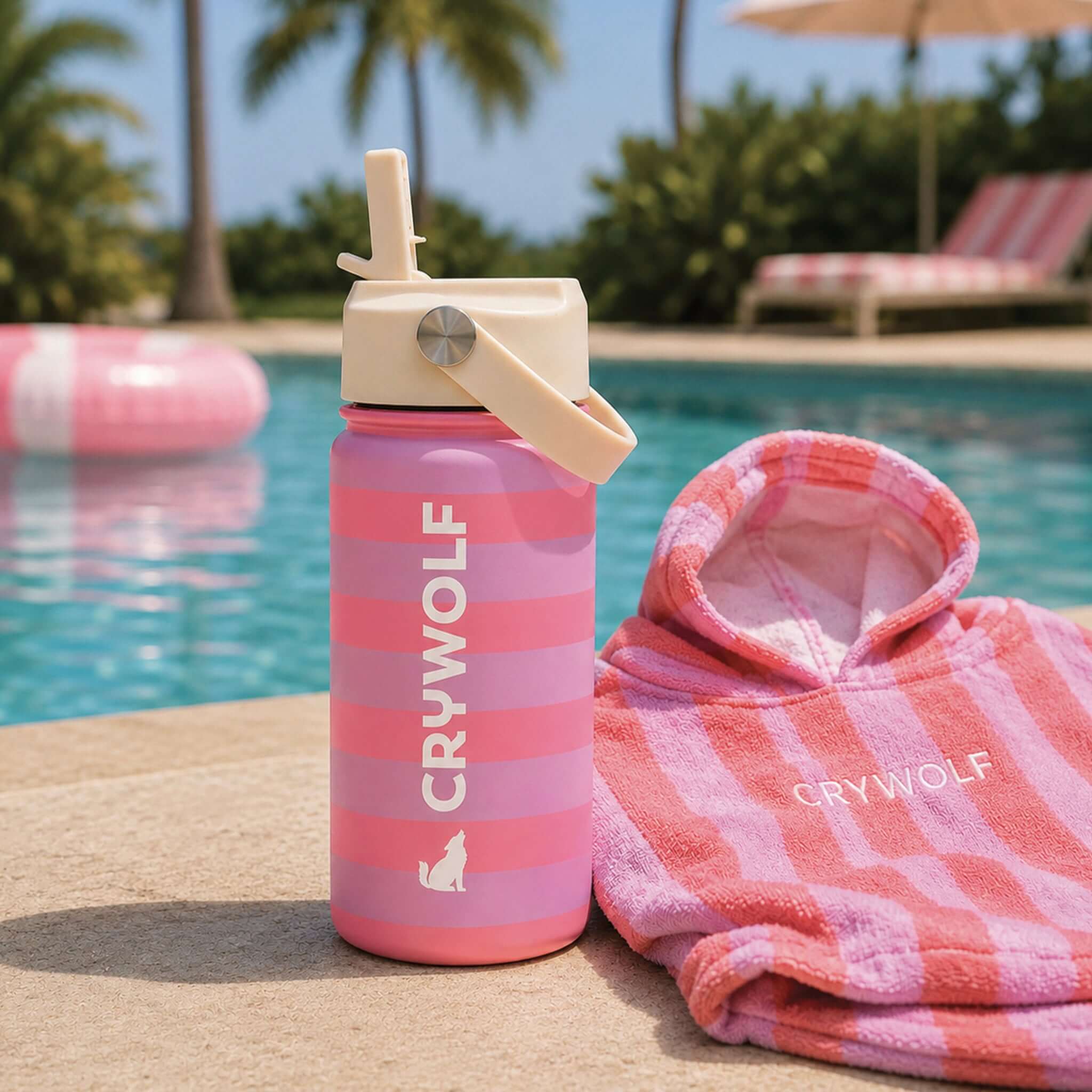 Crywolf Stainless Steel Drink Bottle 360ml - Deck Stripe by the poolside with a cozy towel.