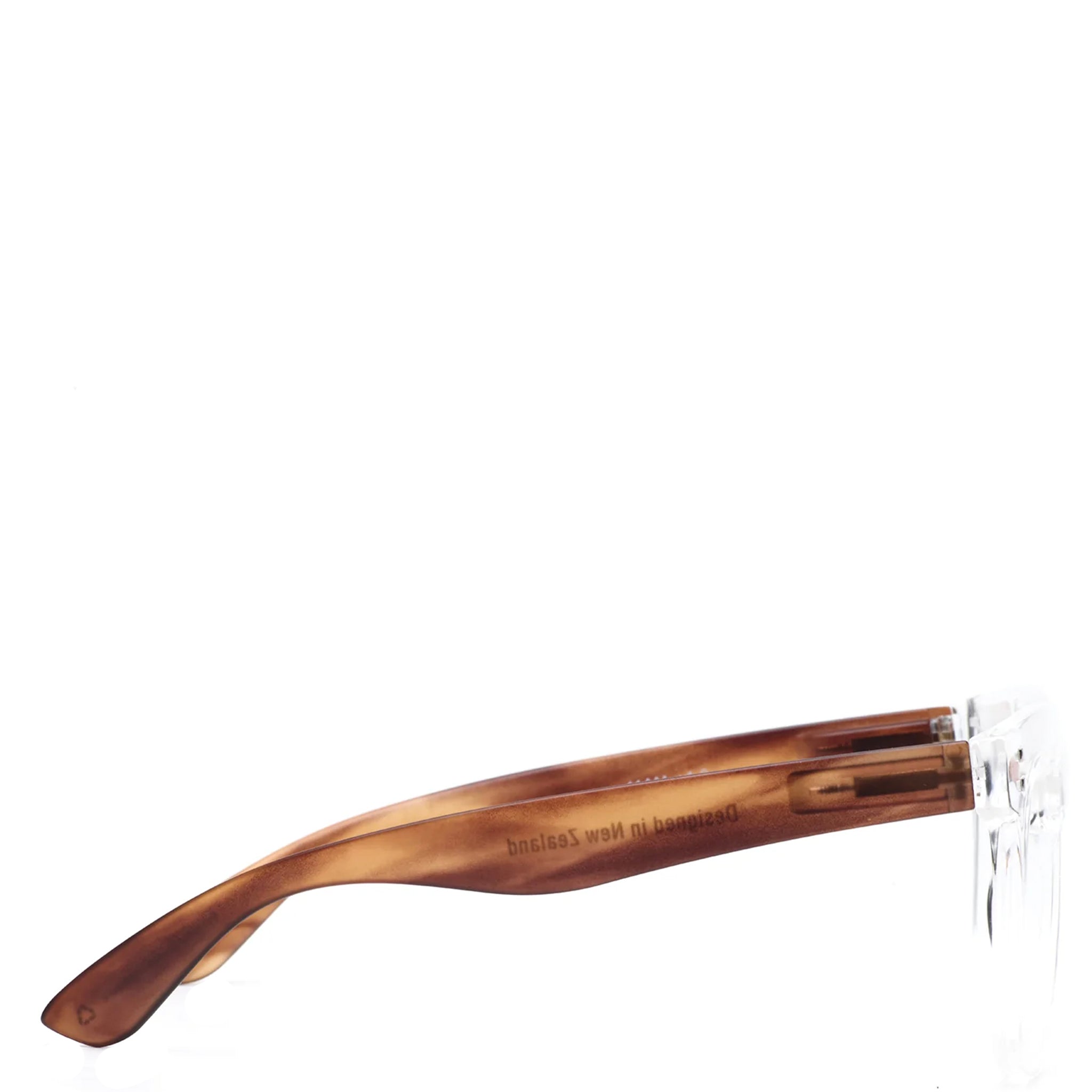 Wooden comb with a clear handle on a white background