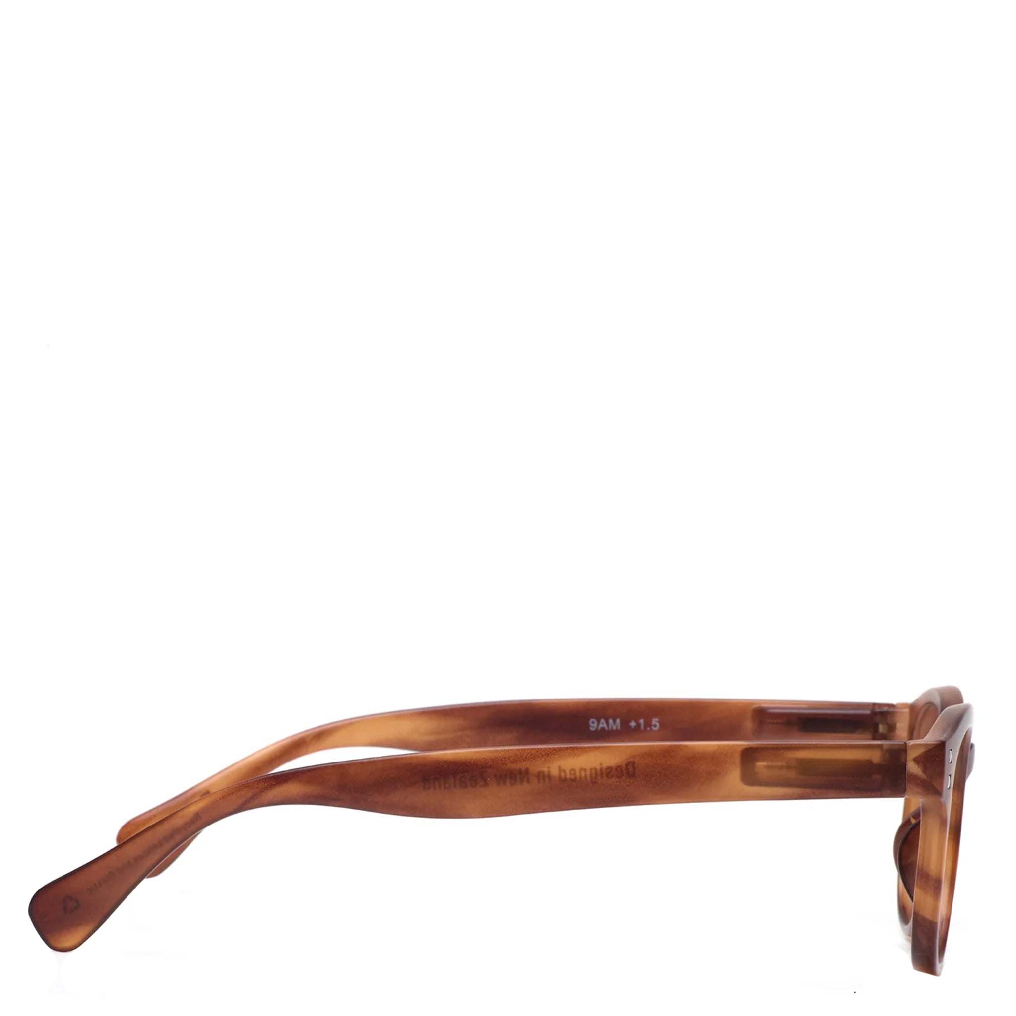 Brown sunglasses with tortoiseshell pattern on a white background