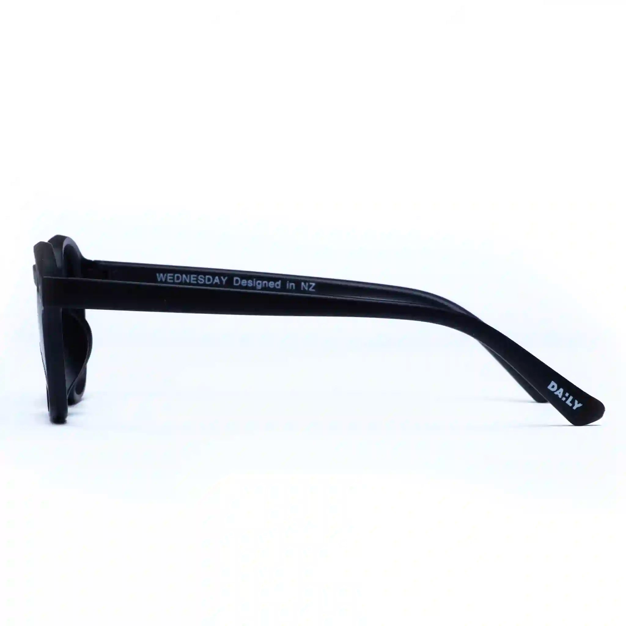 Black sunglasses with 'DAILY' branding on a white background