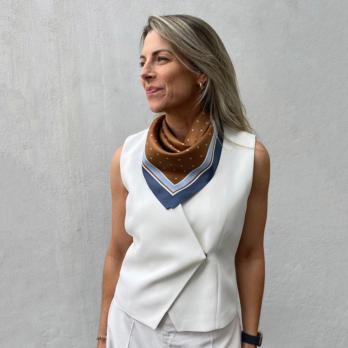 Dark Hampton Petite Silk Scarf - the Borey tied at the neck on model in a white vest
