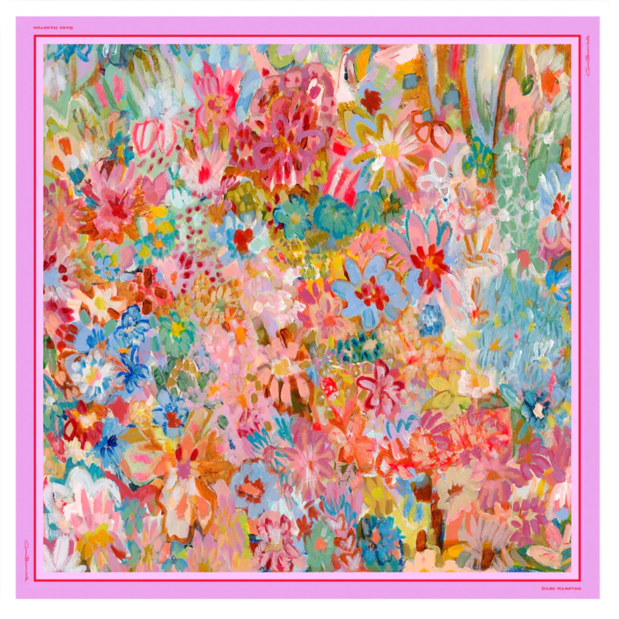 Colorful floral scarf with a pink border on a fabric swatch.