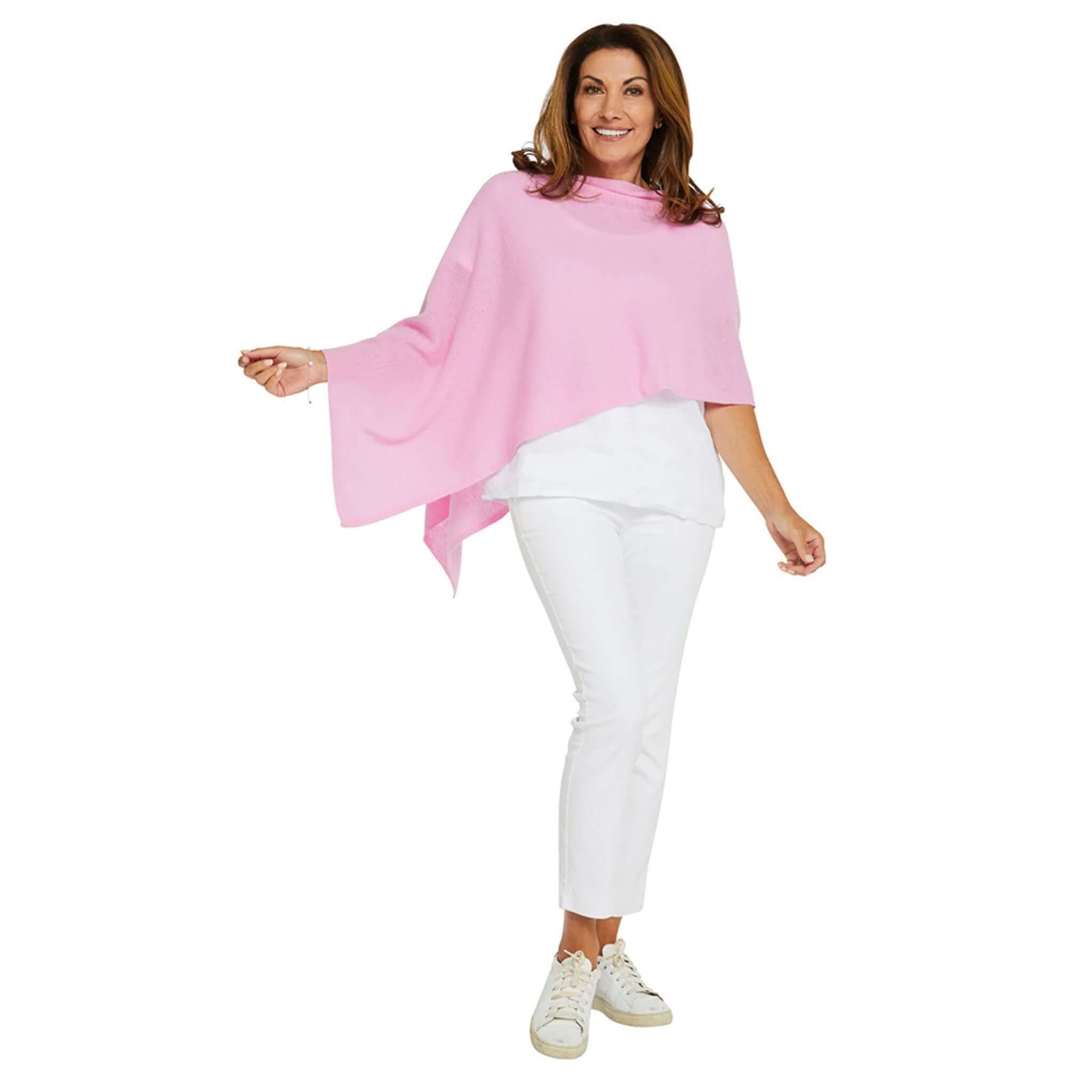 Esperance & Co Classic Cashmere Topper - Glam Pink worn with white outfit, showcasing versatility and style.