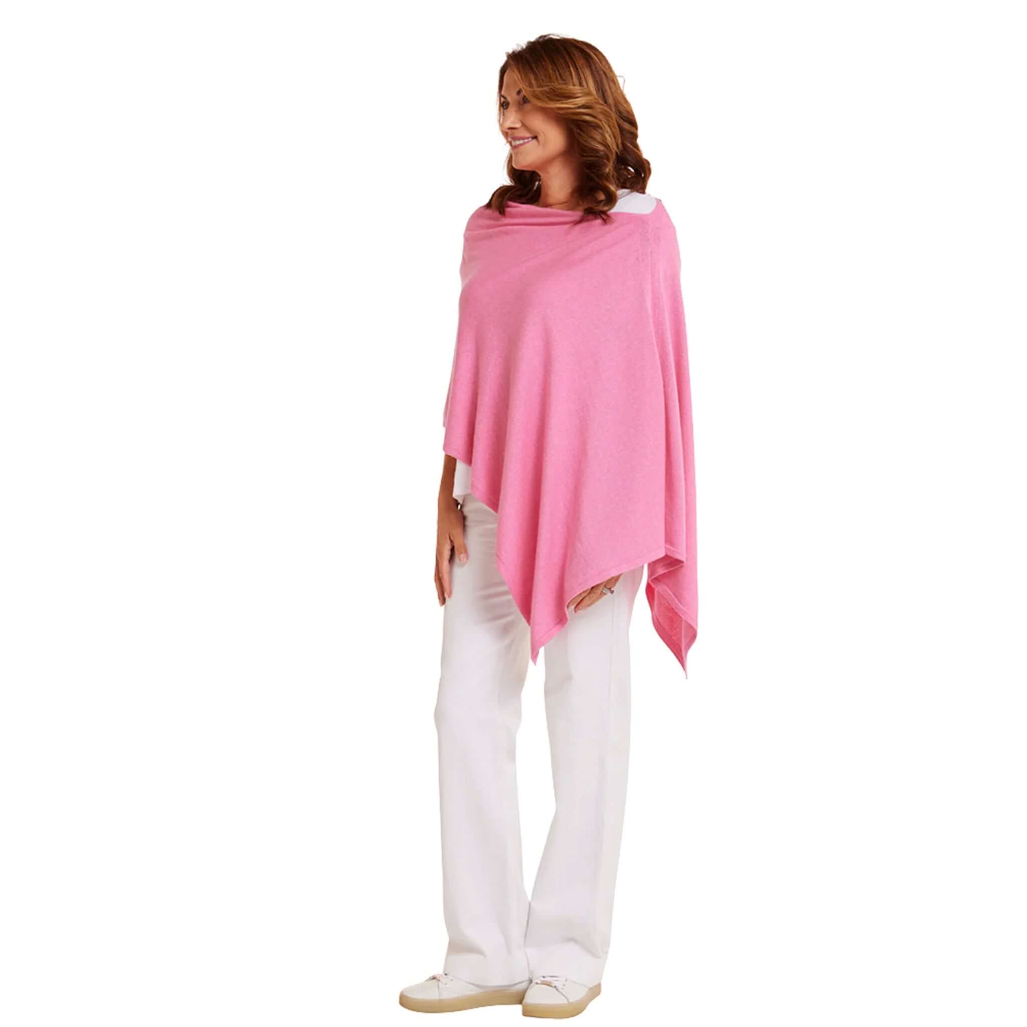 Model wearing the Esperance & Co Classic Cashmere Topper - Glam Pink, showcasing its versatility and elegance.