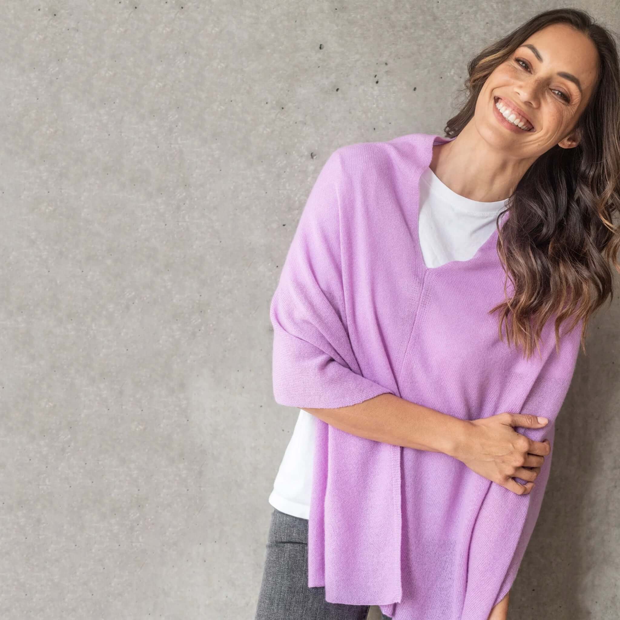 Alt Tag: Esperance & Co Classic Cashmere Topper - Riviera worn as a soft lilac cashmere wrap, chic layering piece for office or travel