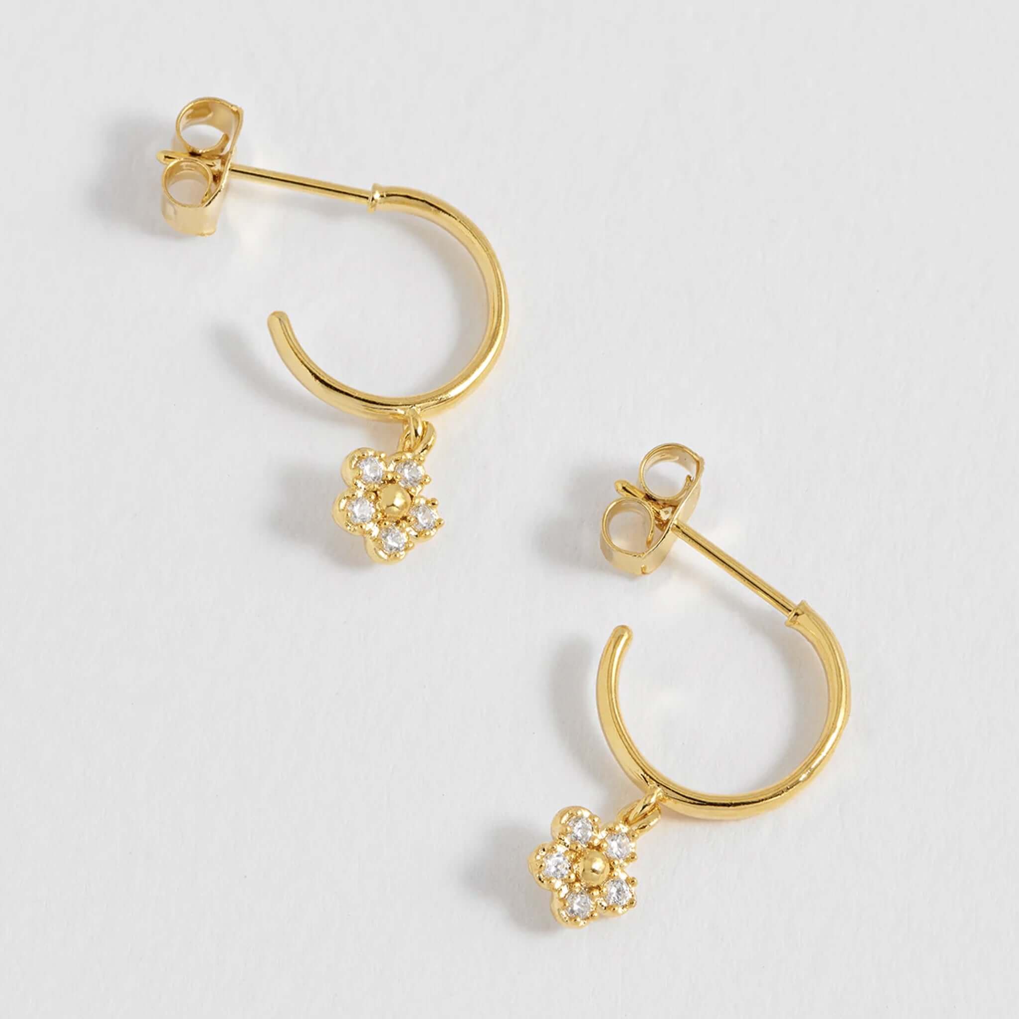 Estella Bartlett Flower Hoop CZ Earrings - Gold Plated with daisy cubic zirconia charm, petite lightweight gold hoop earrings