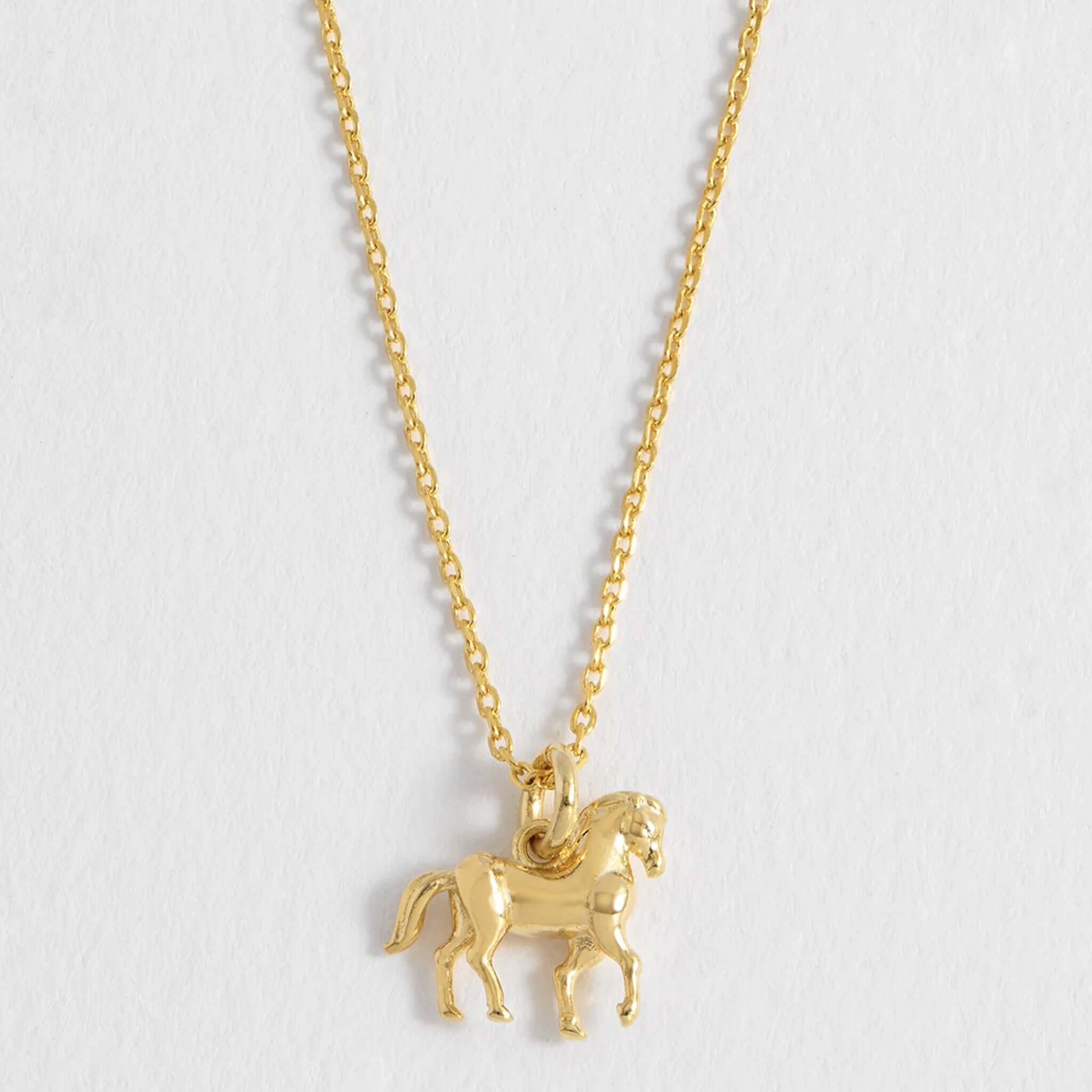 Alt Tag: Estella Bartlett Horse Necklace - Gold Plated gold plated trotting horse pendant on delicate chain, dainty everyday layered necklace
