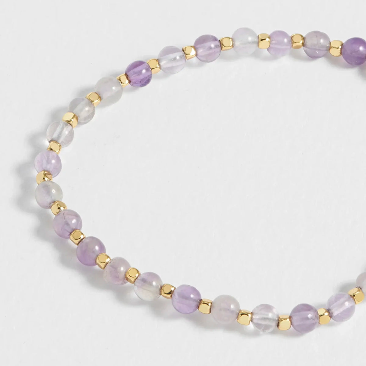 Estella Bartlett Amelia Bracelet - Amethyst close-up of the purple beads and gold spacers