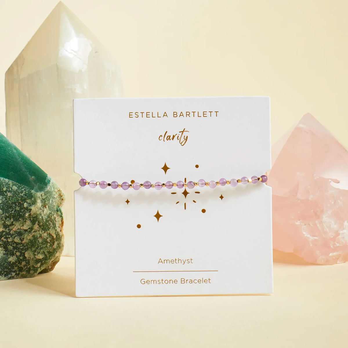 Estella Bartlett Amelia Bracelet - Amethyst on its Clarity gemstone card with crystals