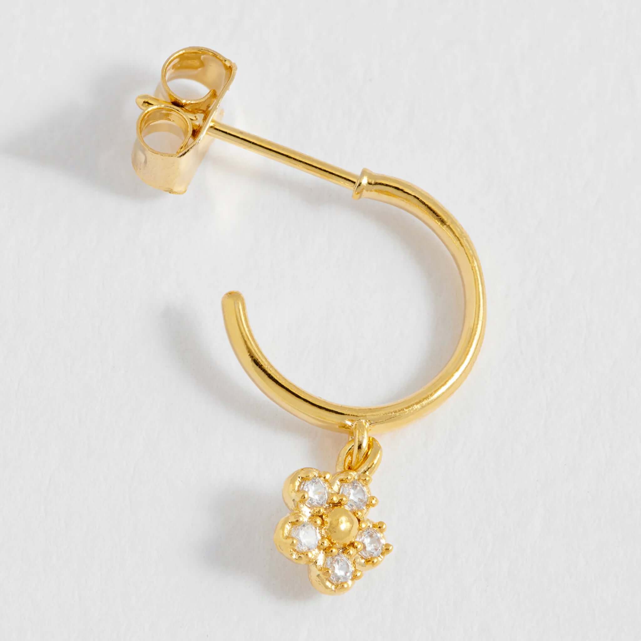 Alt Tag: Estella Bartlett Flower Hoop CZ Earrings - Gold Plated gold hoop earring with CZ daisy charm, lightweight floral sparkle