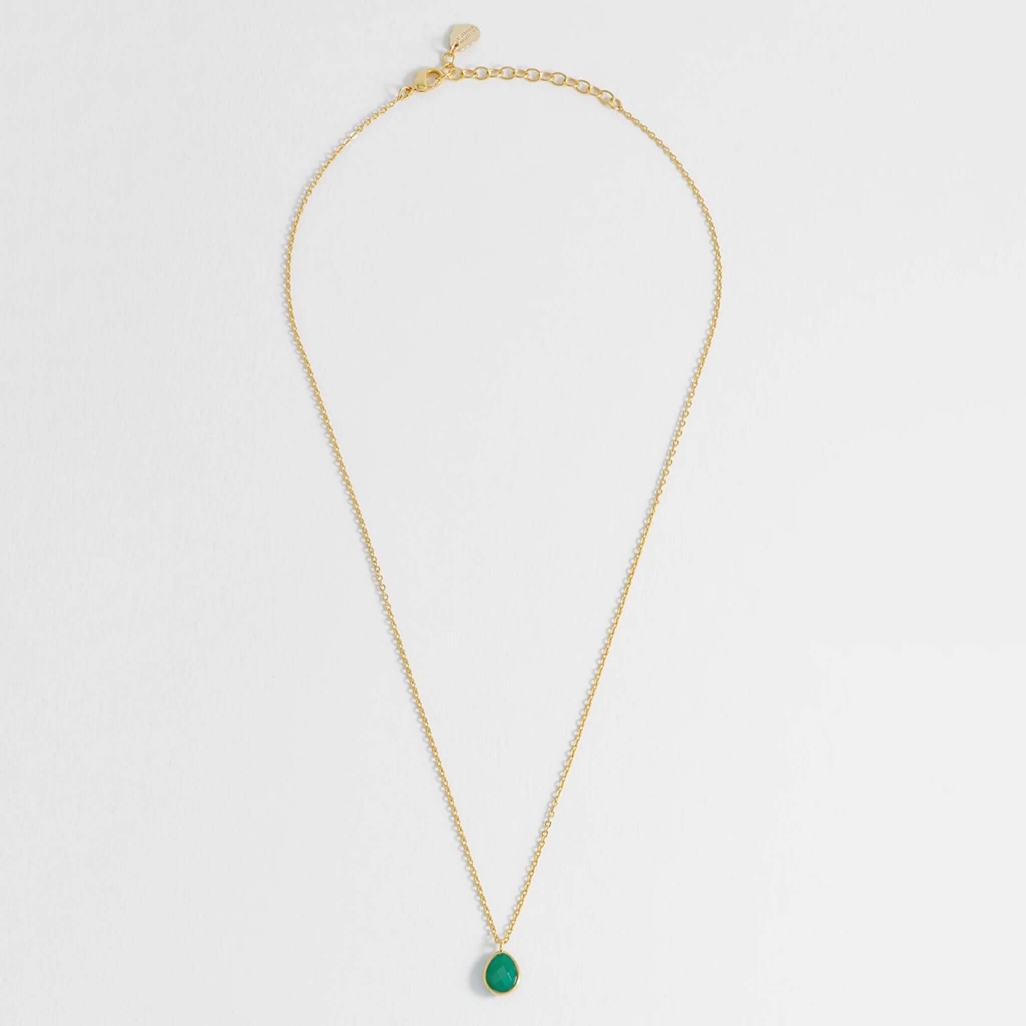 Estella Bartlett Wellness Faceted Teardrop Necklace - Green Agate on a gold-plated chain with a vibrant green agate pendant.