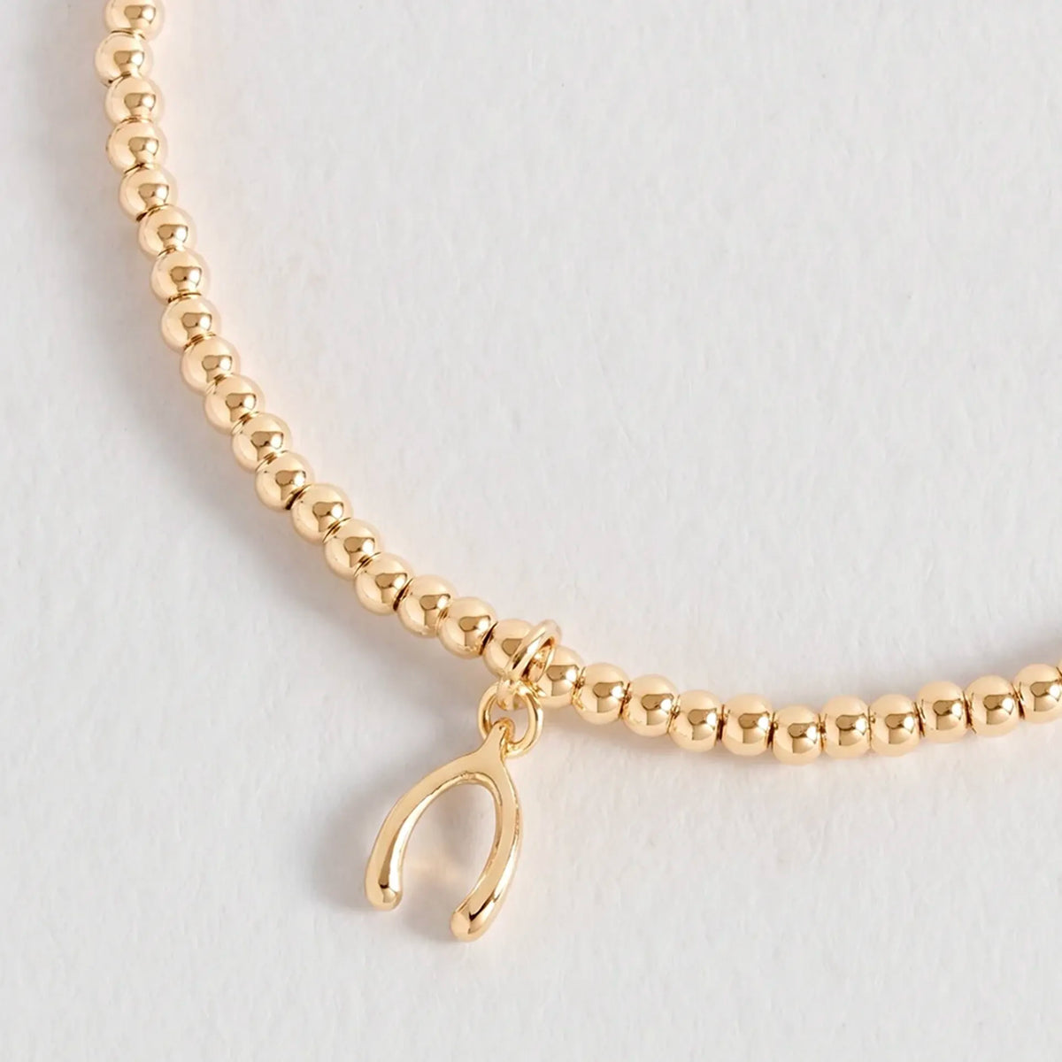 Estella Bartlett Wishbone Bracelet