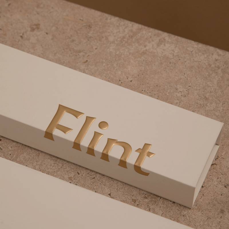 Gold Flint lighter in a box