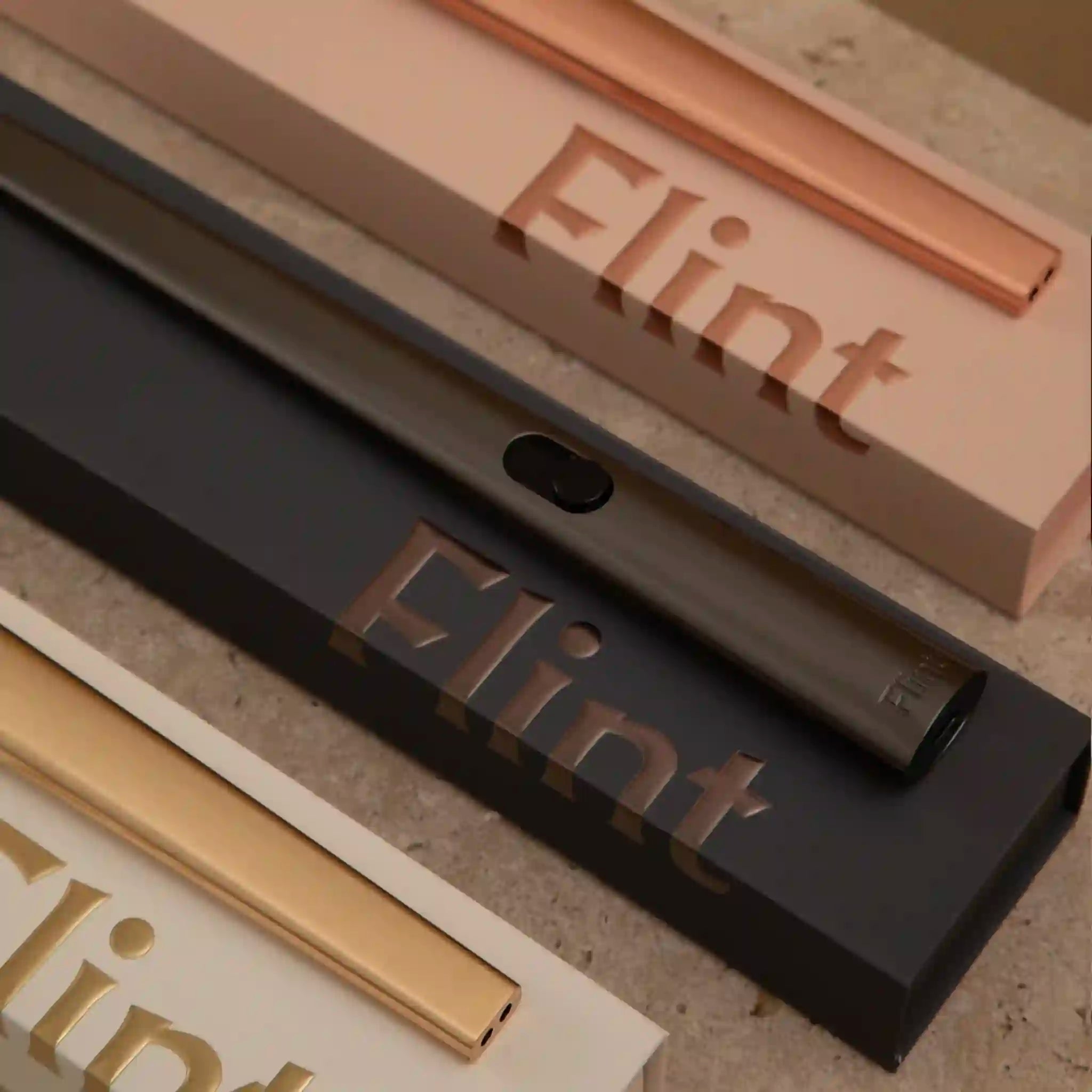 Close-up of Flint products with 'Flint' branding on a textured surface