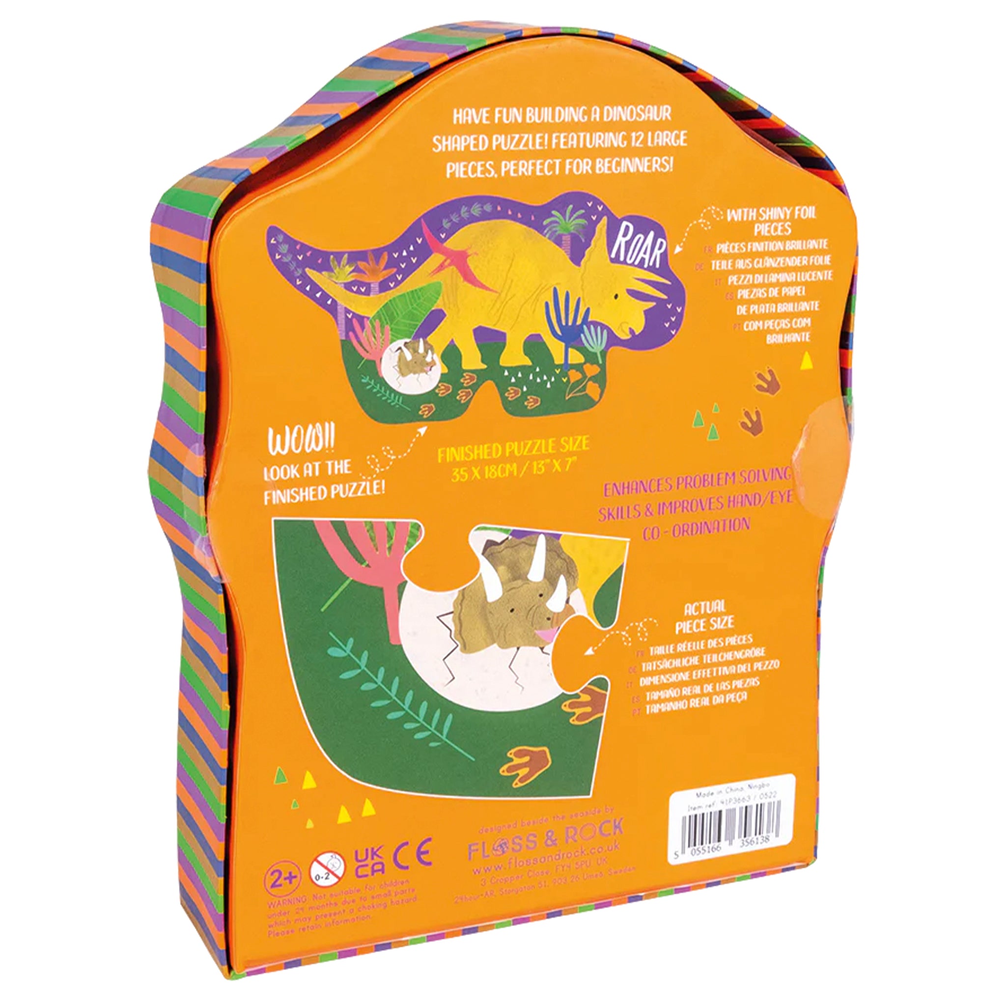 Dinosaur-shaped puzzle packaging with colorful design and text on a white background
