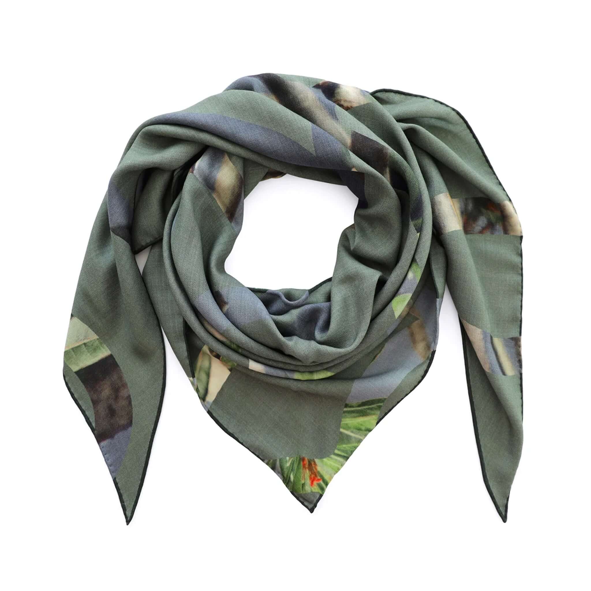 Alt Tag: Good & Co Heritage Triangle Wool & Silk Scarf - Olive oversized triangle scarf in wool-silk herringbone weave with heritage print