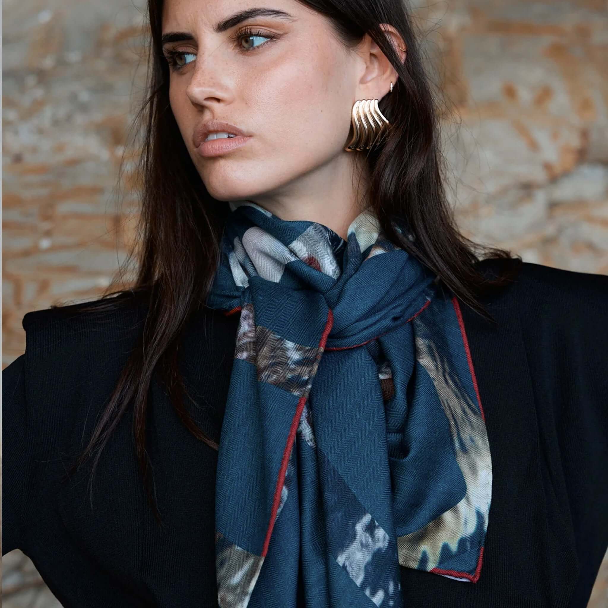Alt Tag: Good & Co Heritage Triangle Wool & Silk Scarf - Petrol worn styled at neck, double-sided logo print, contrast hem, lightweight wool-silk