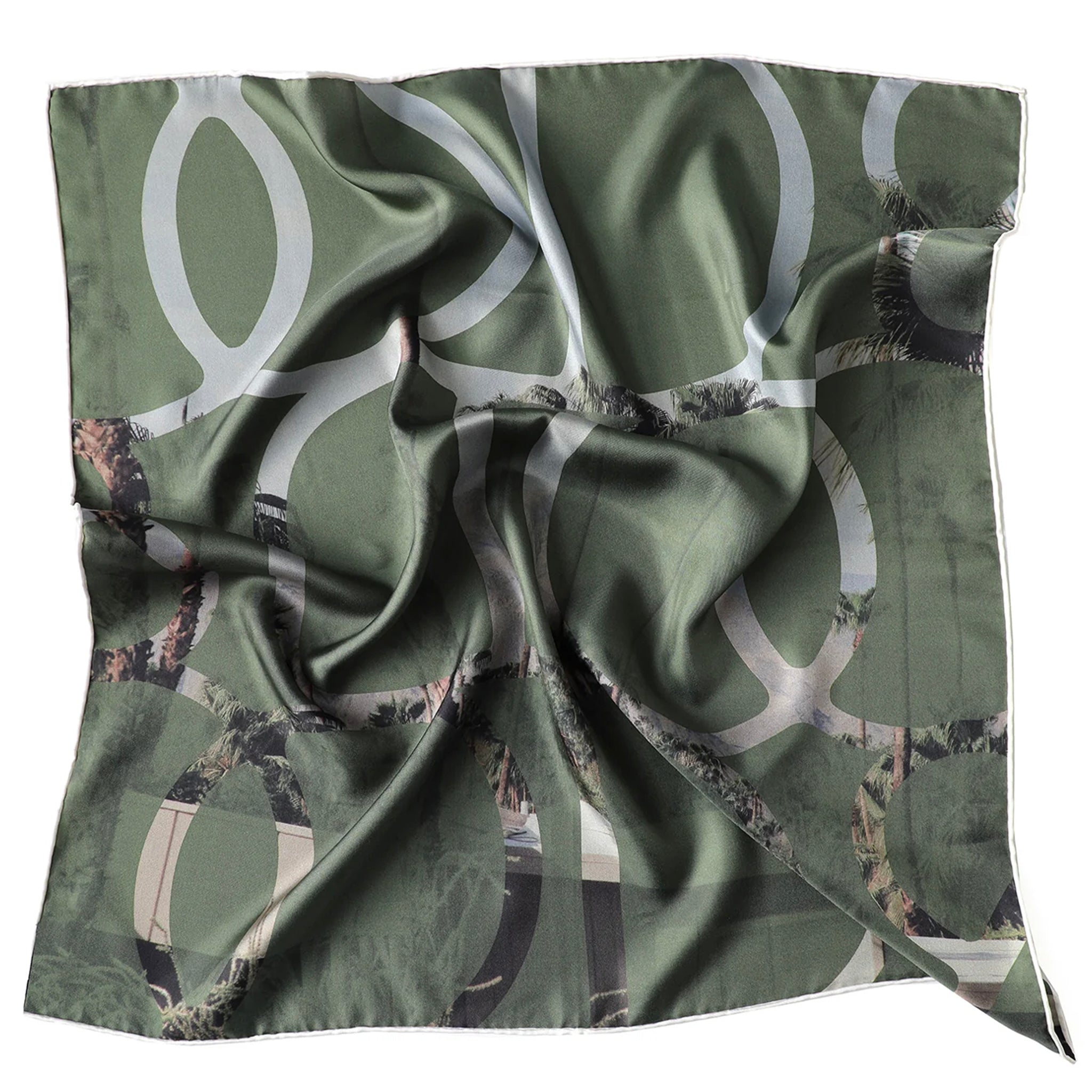 Green satin scarf with abstract pattern on a white background