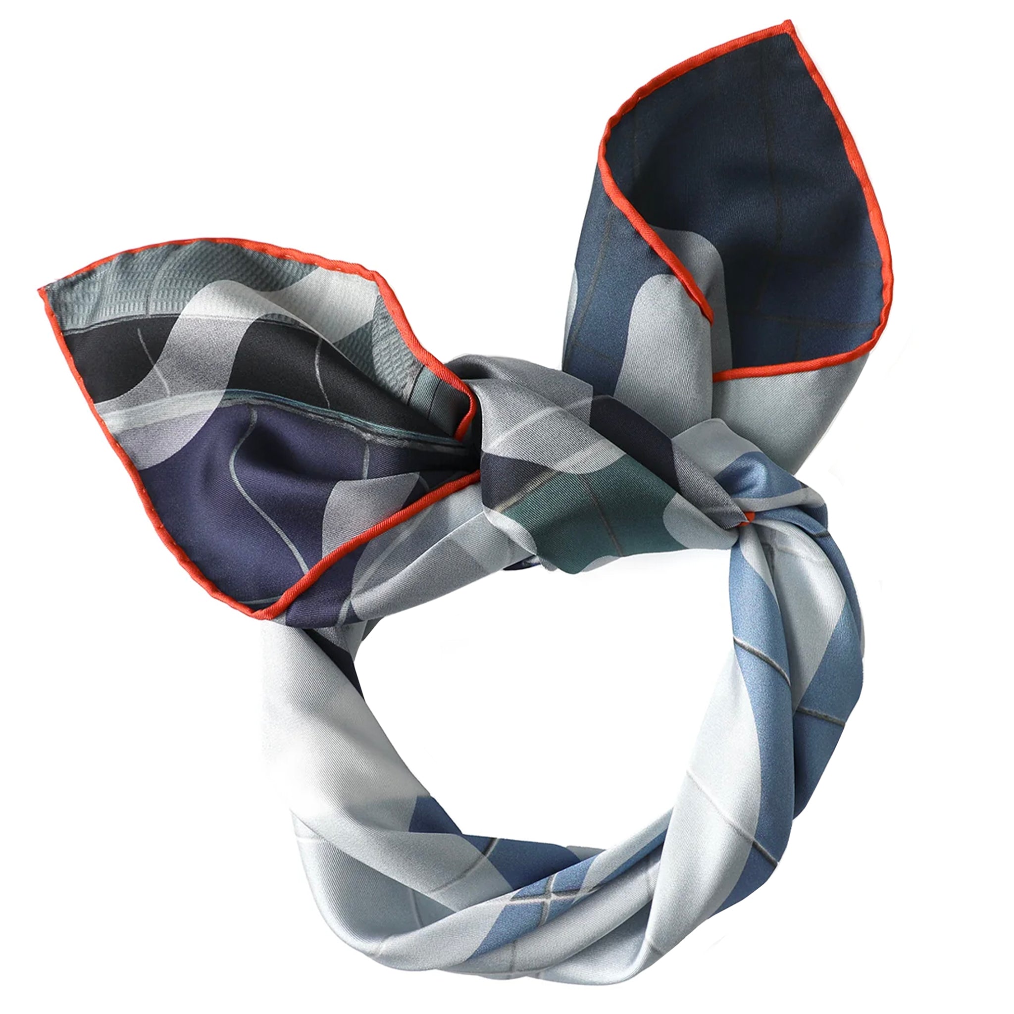 Plaid patterned headband with orange trim on a white background