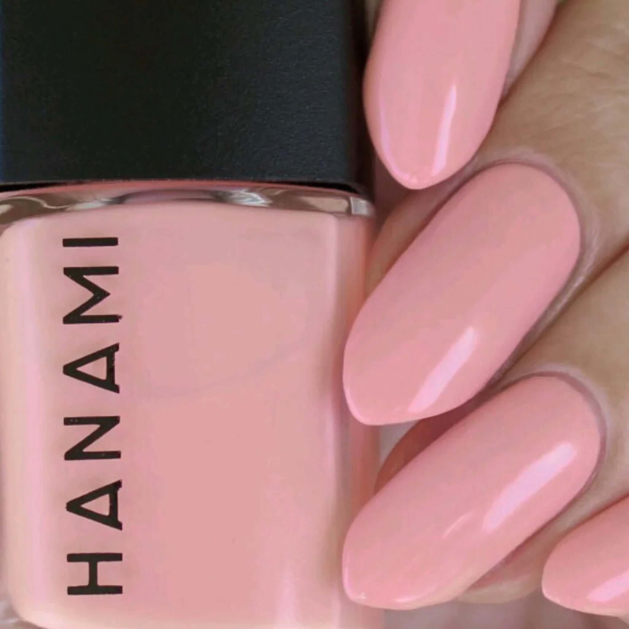 Alt Tag: Hanami Plant Based Nail Polish - April Sun in Cuba soft pink vegan 21-free breathable plant-based nail polish bottle and manicure