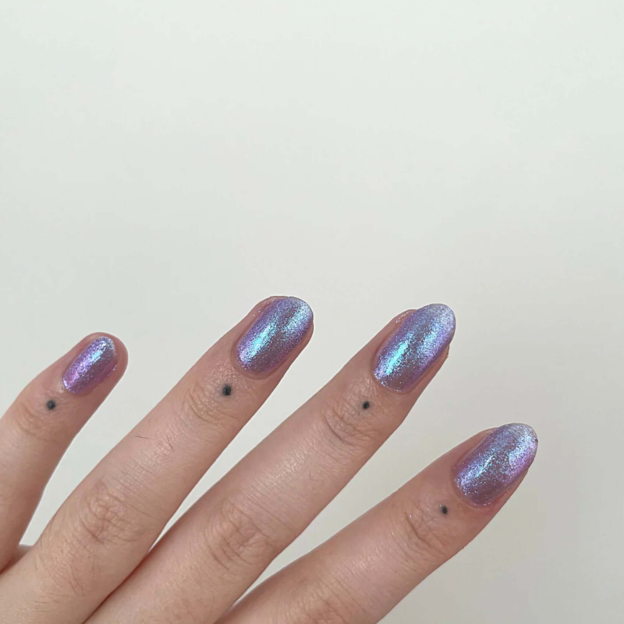 Alt Tag: Hanami Plant Based Nail Polish - Mood Ring swatch on nails, vegan 21-free non-toxic breathable plant-based shimmer colour