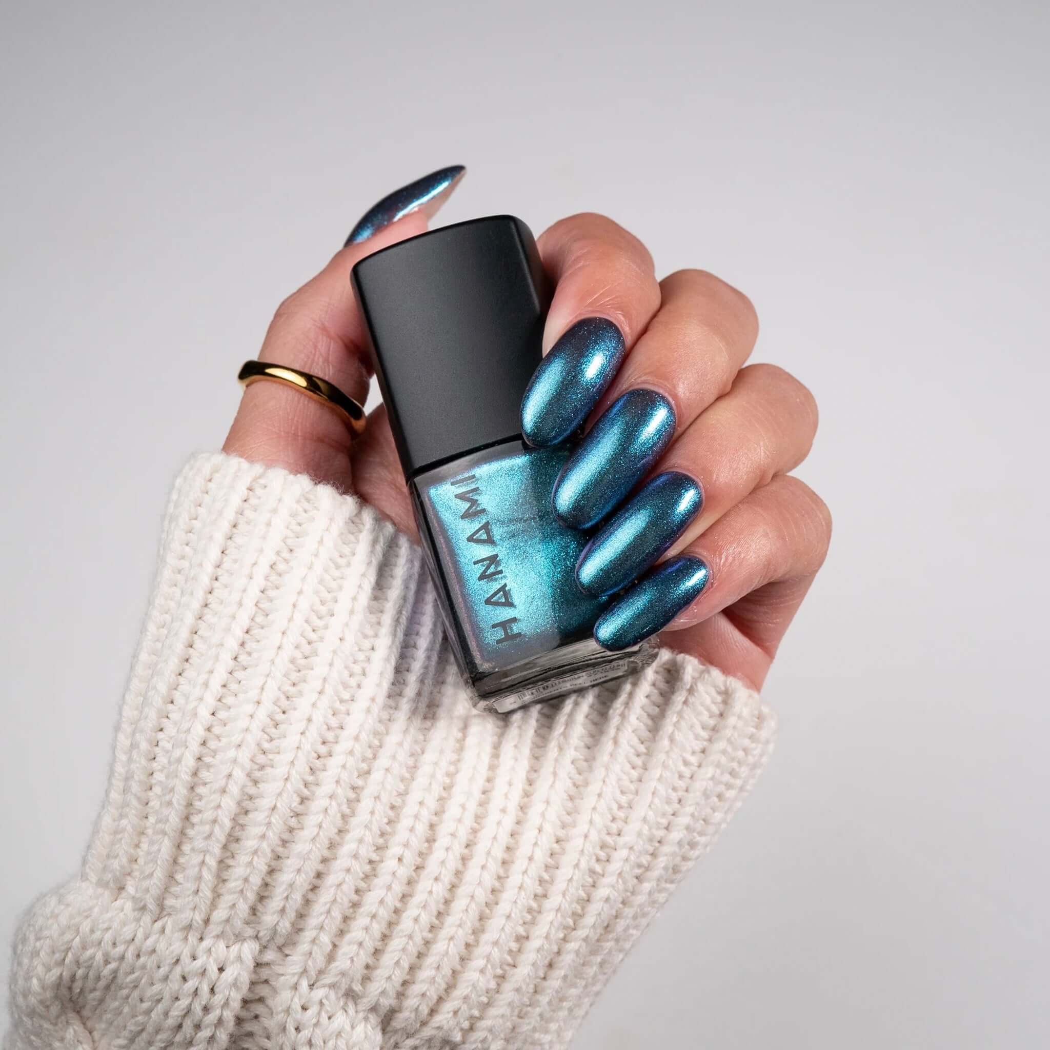 Alt Tag: Hanami Plant Based Nail Polish - Phenomena metallic blue vegan 21-free breathable plant-based nail polish 15ml bottle