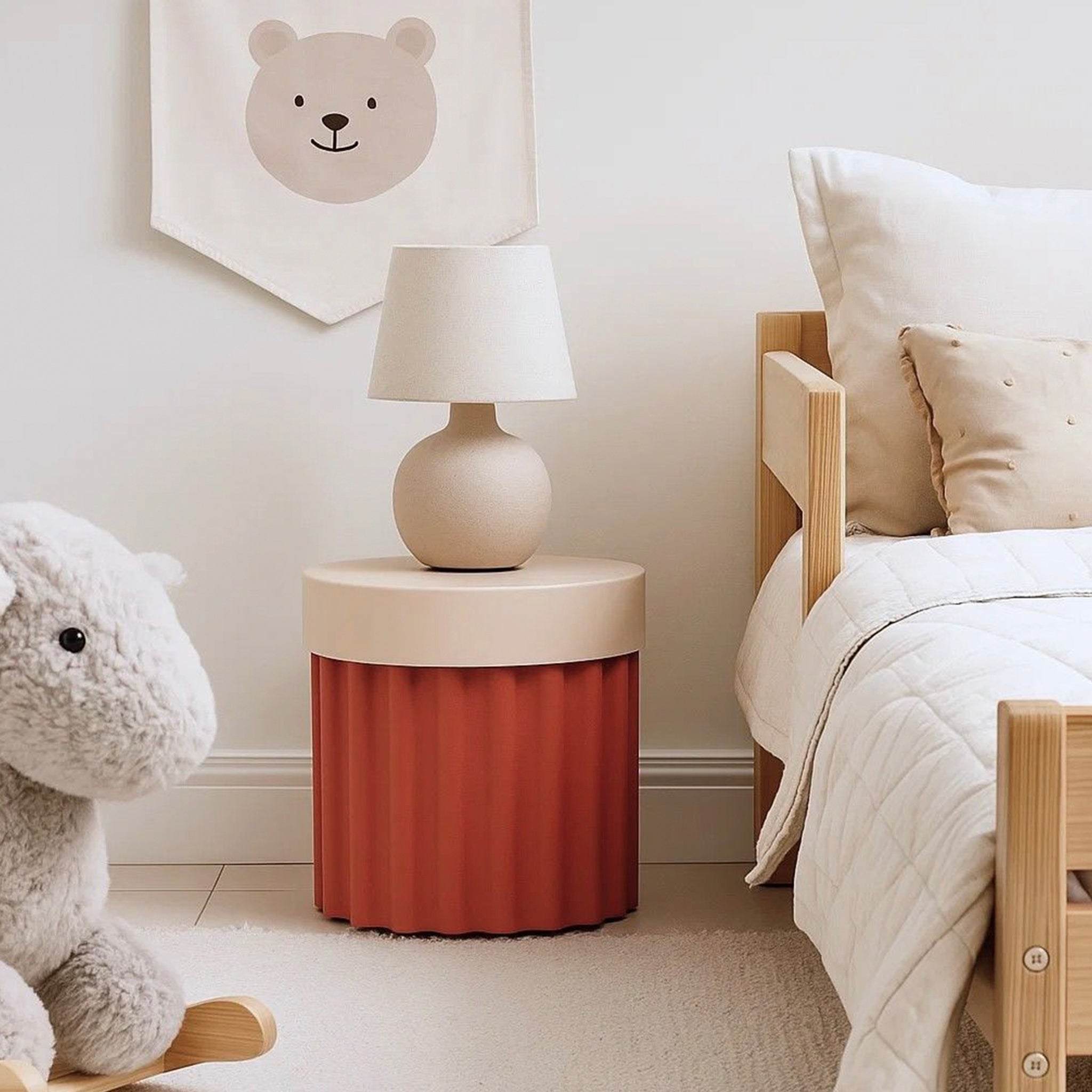 Harry Stool / Side Table in Green in a child's bedroom setting.
