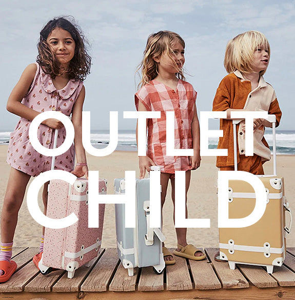 Kids on a beach with Olli Ella See-Ya Suitcases