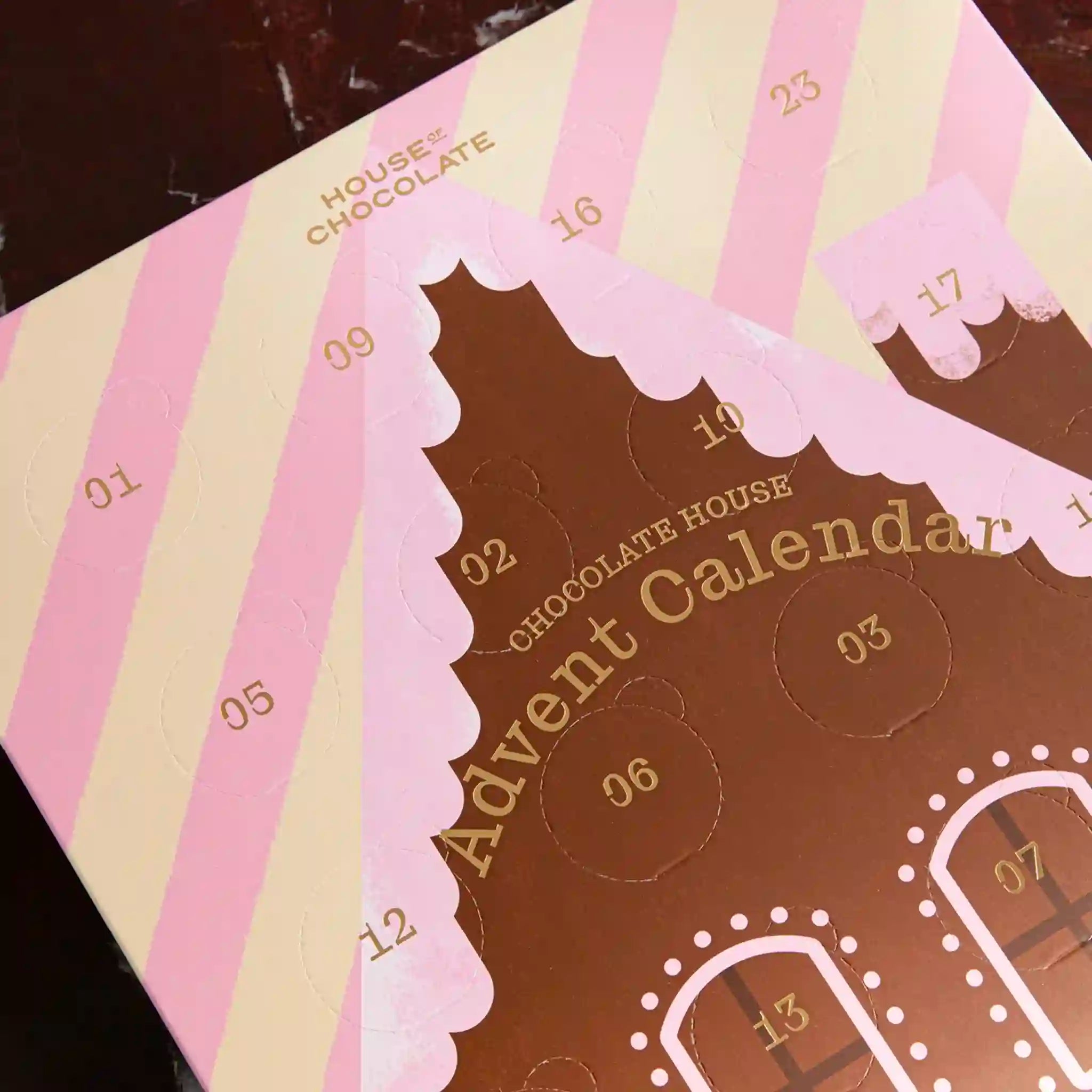 Close-up of a chocolate advent calendar with pink and white stripes