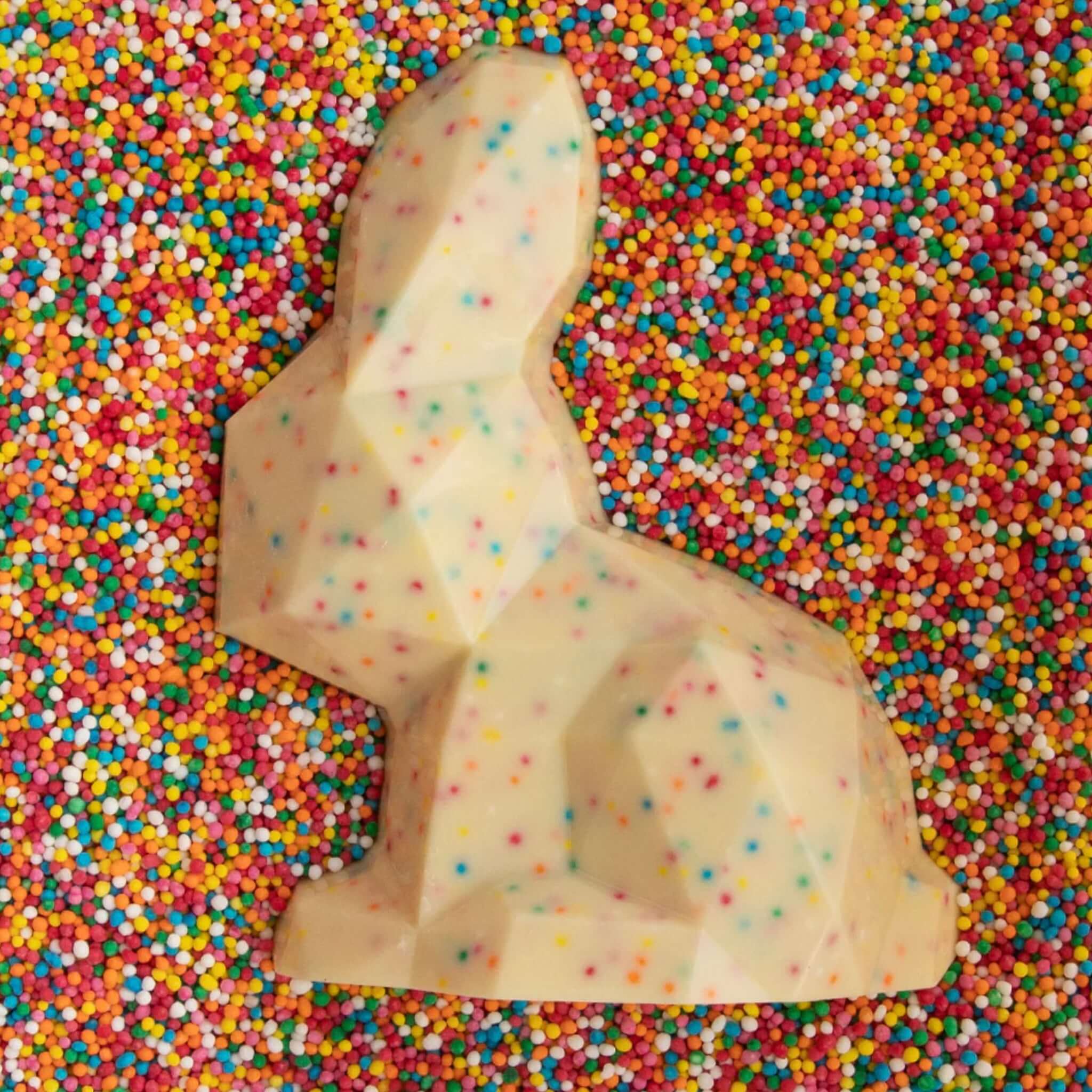 Alt Tag: House of Chocolate Sprinkle White Chocolate Bunny in 28% couverture white chocolate with colourful sprinkles, Easter bunny treat