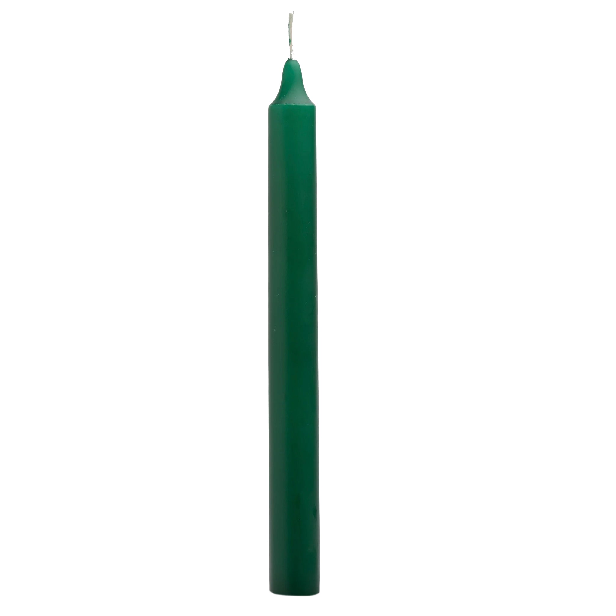 Green candle on a white background