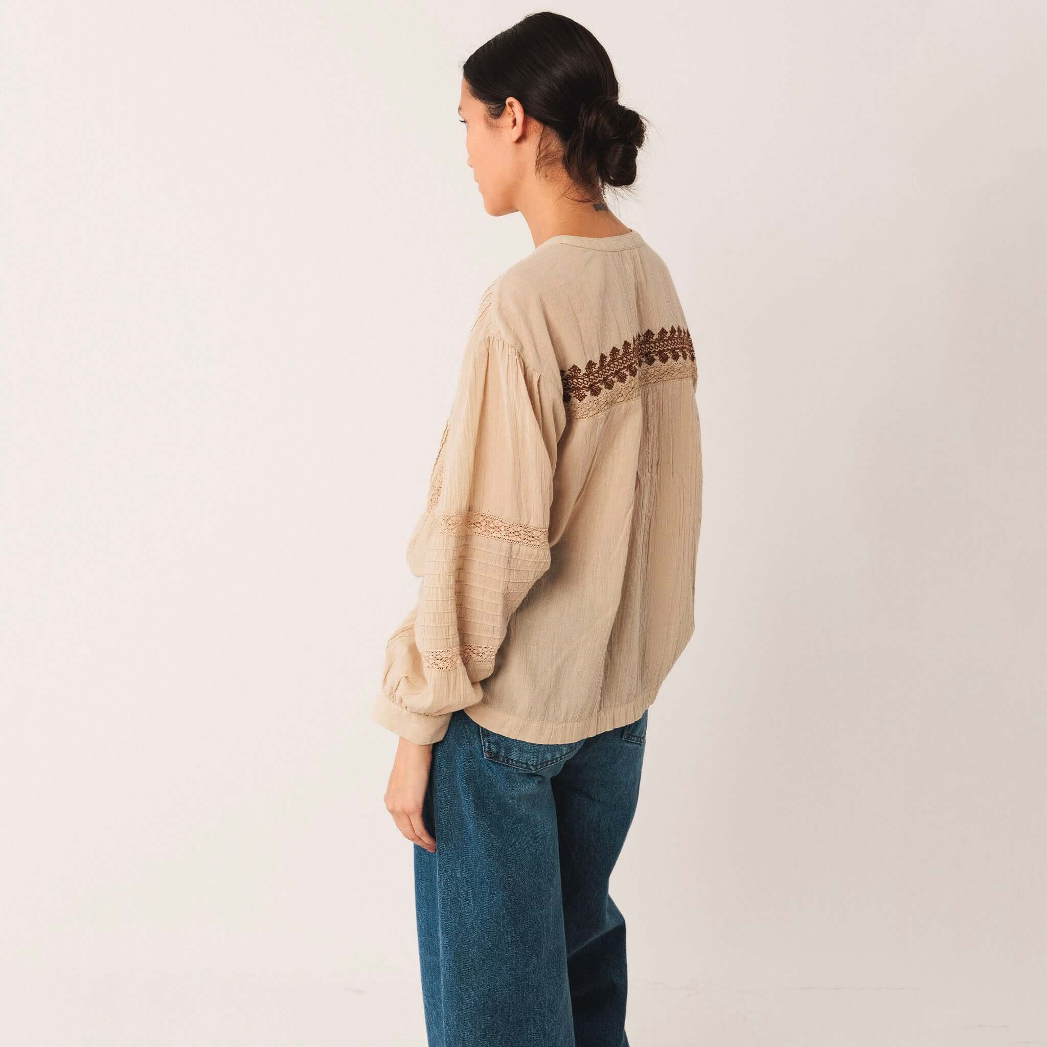 Alt Tag: Indi & Cold Organic Cotton Ethnic Embroidered Blouse - Stone back view, organic cotton gauze blouse with embroidered yoke and balloon sleeves