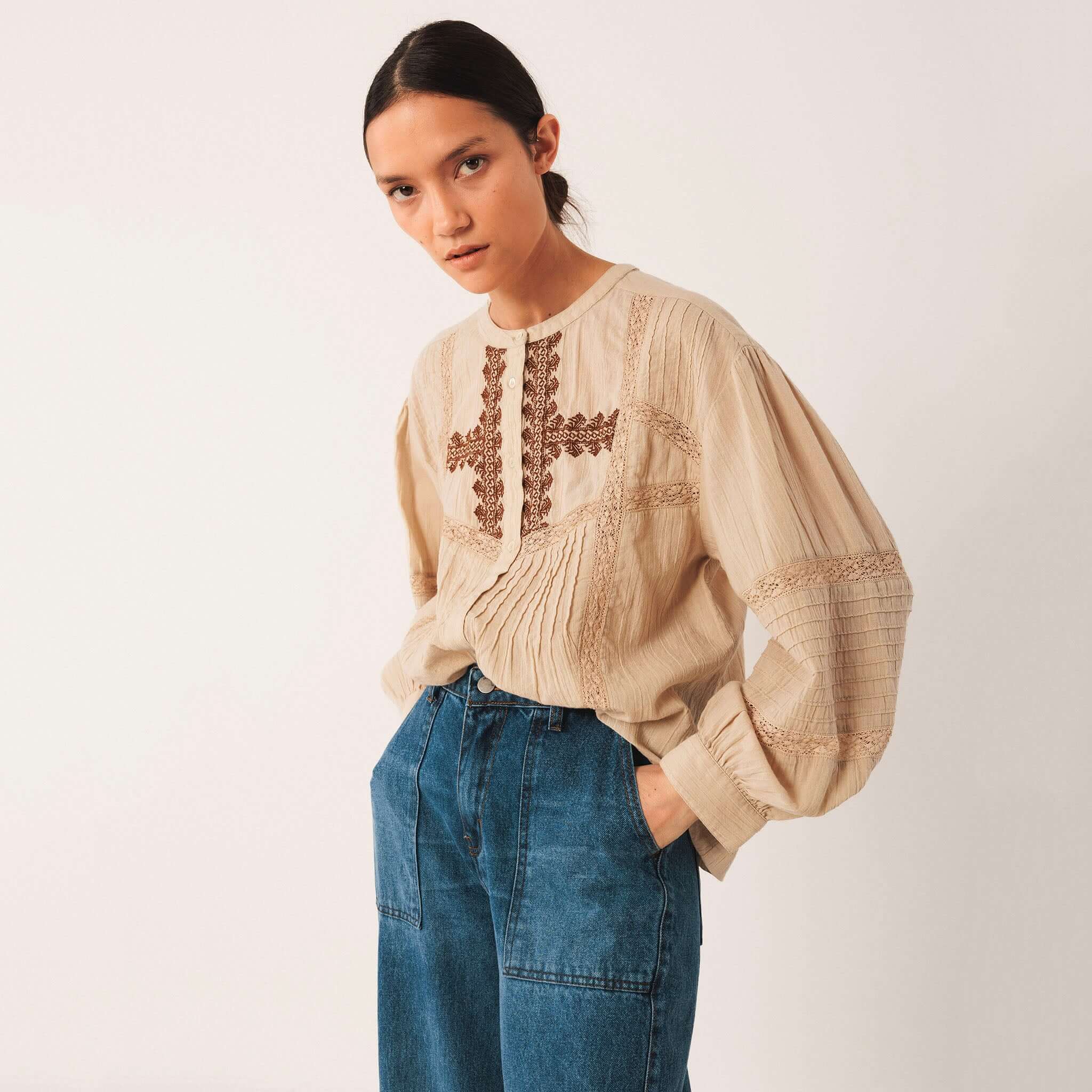 Alt Tag: Indi & Cold Organic Cotton Ethnic Embroidered Blouse - Stone on model, organic cotton gauze with ethnic embroidery and balloon sleeves