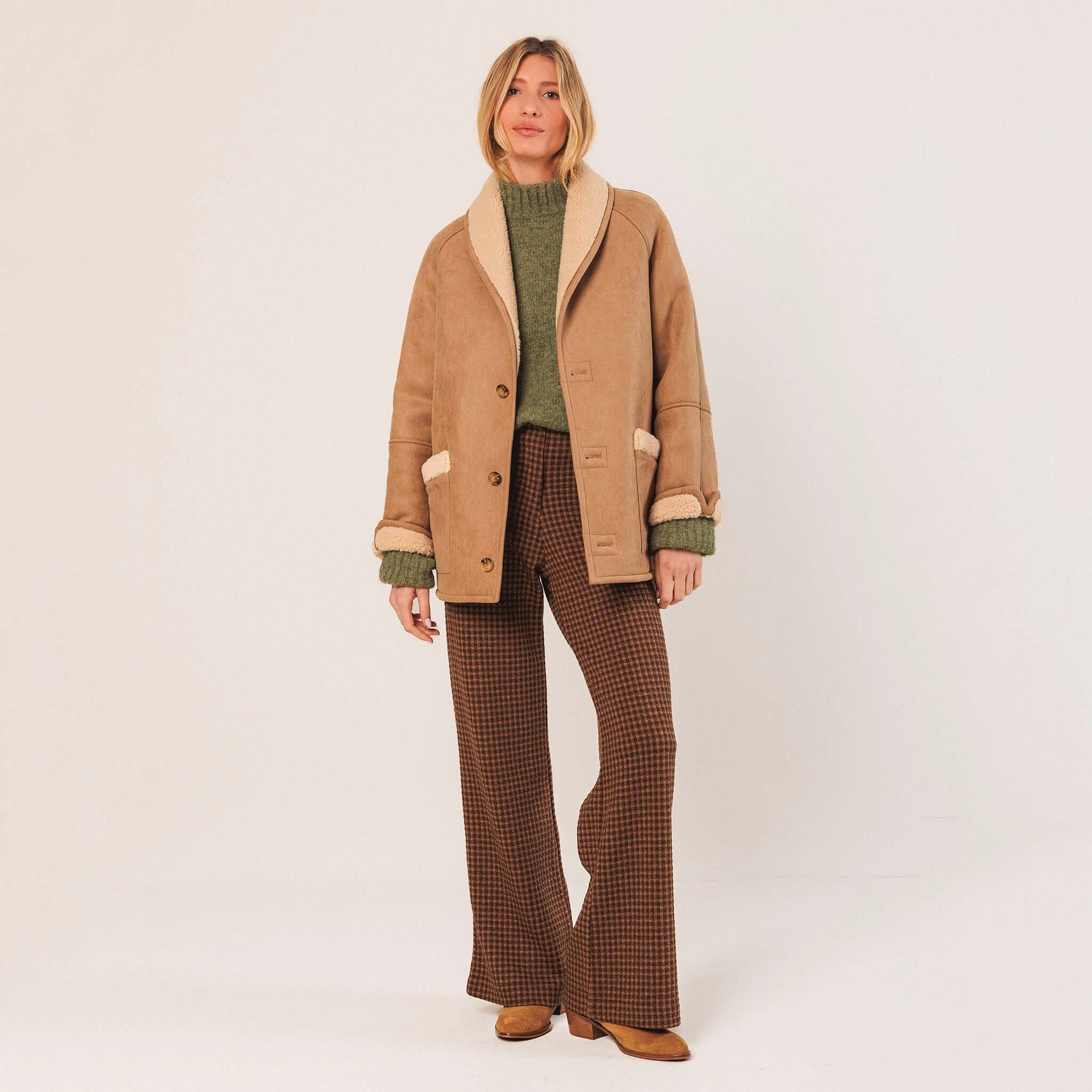 Indi & Cold Perkins Collar Jersey - Mint styled with a tan shearling coat and brown checked trousers, relaxed everyday knit