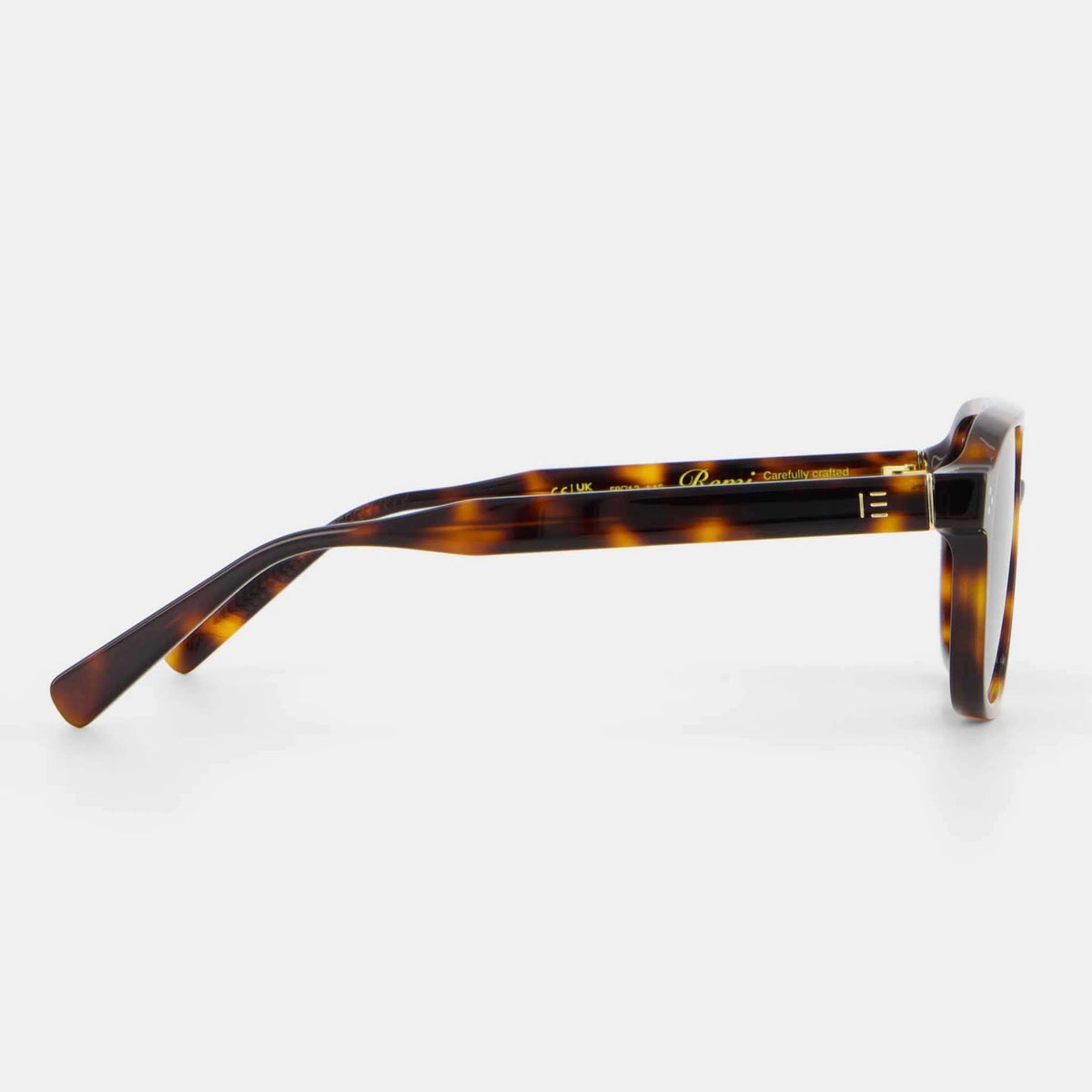 Isle of Eden Sunglasses - Remi Tortoise side view showcasing bio-acetate frame with exposed temple wire.