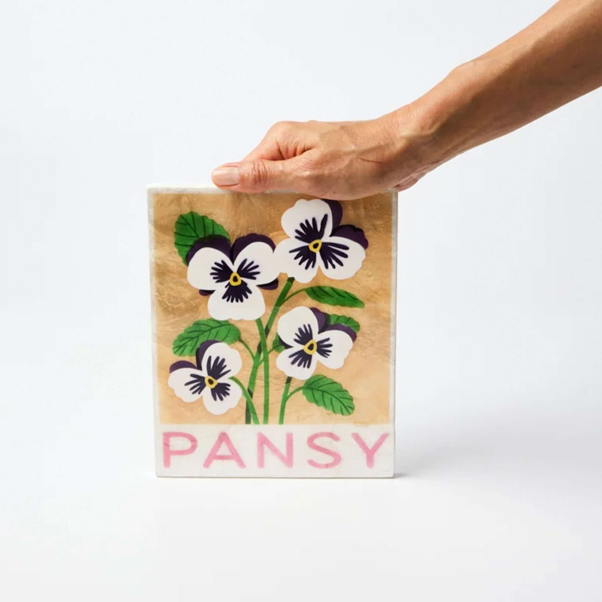 Jones & Co Capiz Shell Market Wall Art - Pansy featuring hand-painted pansy flowers on Capiz shell.