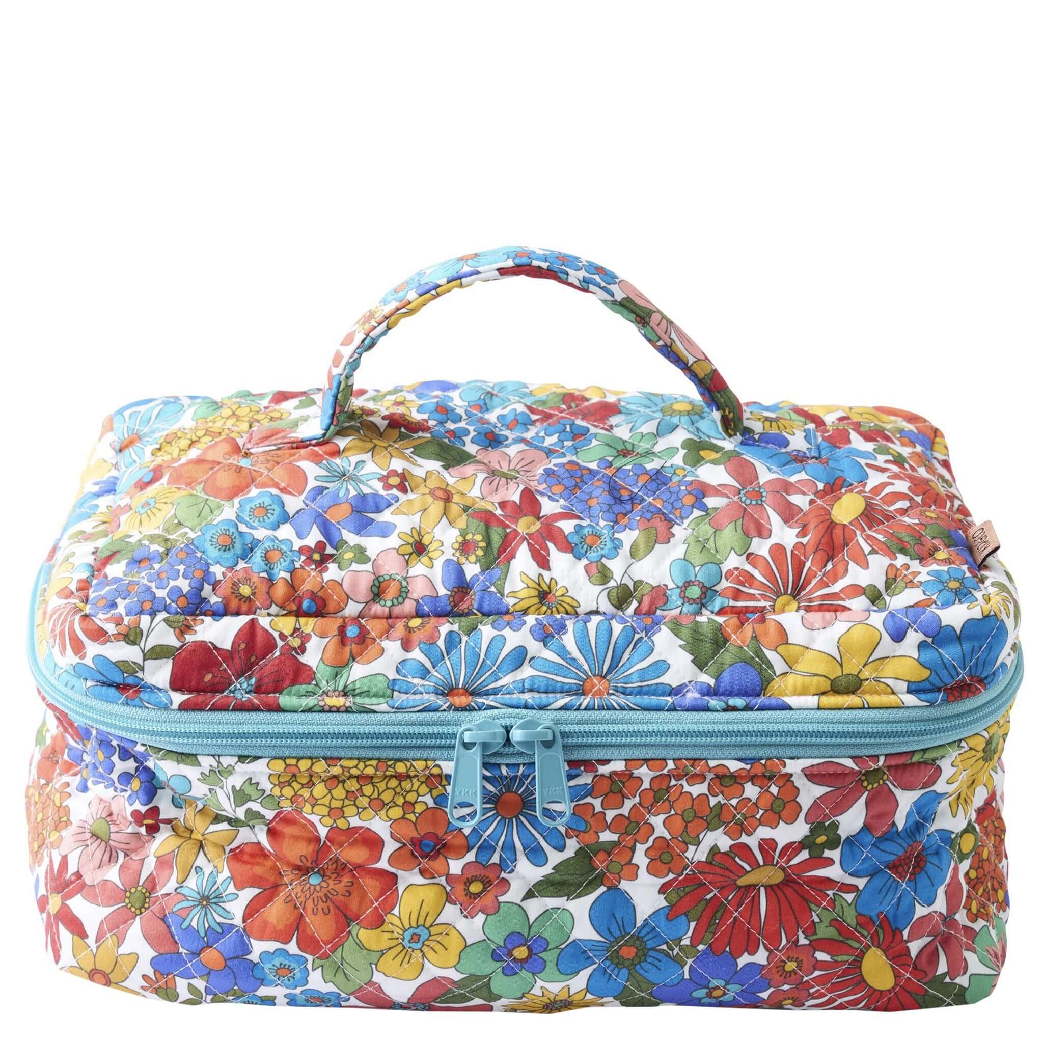 Alt Tag: Kip & Co Quilted Toiletry Case - Winter Fields quilted cotton zip toiletry bag with floral print and top handle
