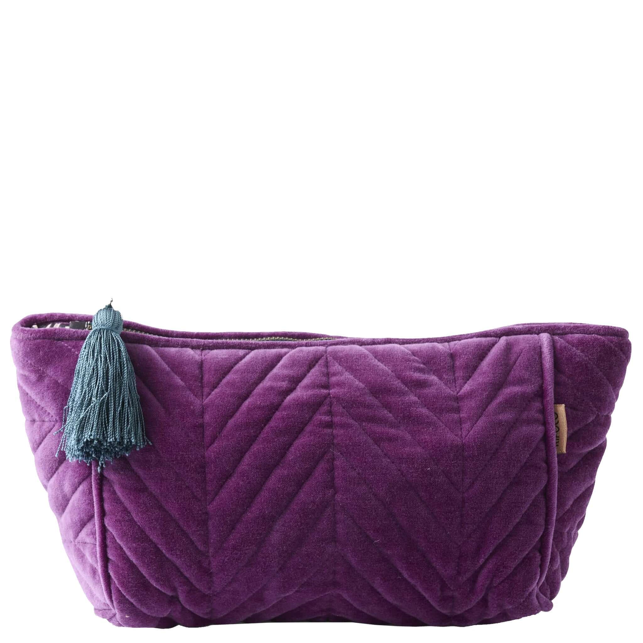 Alt Tag: Kip & Co Velvet Toiletry Bag - Wild Grape purple cotton velvet cosmetic bag with quilted design and blue tassel, zip closure