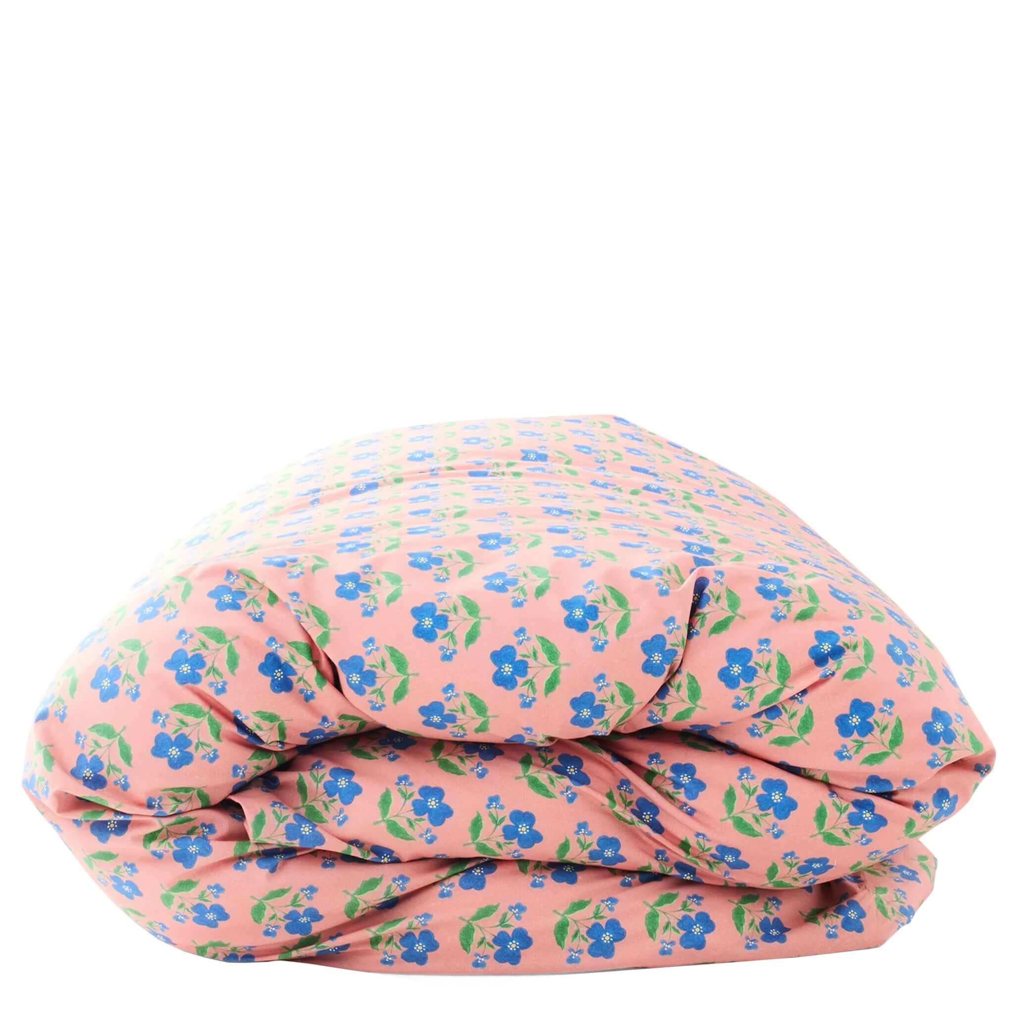 Kip & Co x Anna Spiro Organic Cotton Duvet Cover - Indian Summer Pink, folded floral quilt cover.