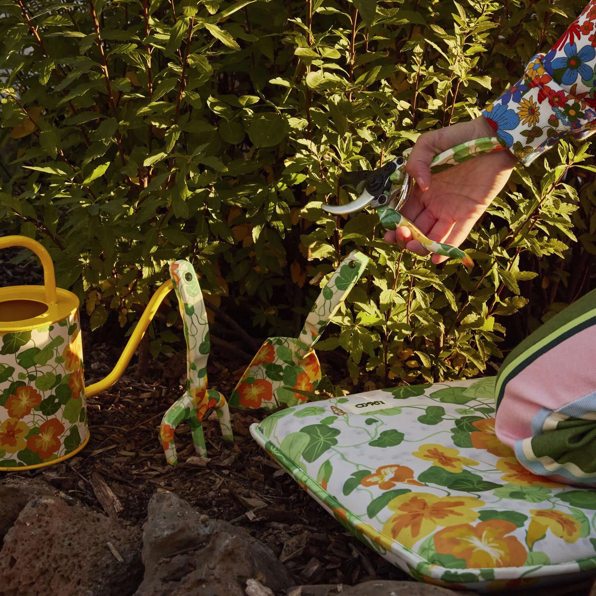 Alt Tag: Kip & Co Garden Tools & Gloves Set - Nasturtium gardening tools and gloves in floral print with secateurs, trowel and watering can