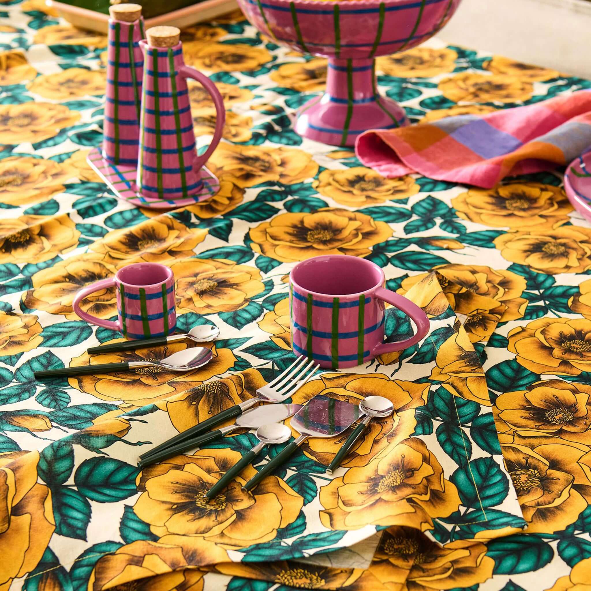 Alt Tag: Kip & Co Linen & Cotton Tablecloth - Golden Peony with golden peony floral print, blue leaves on white, styled dining table