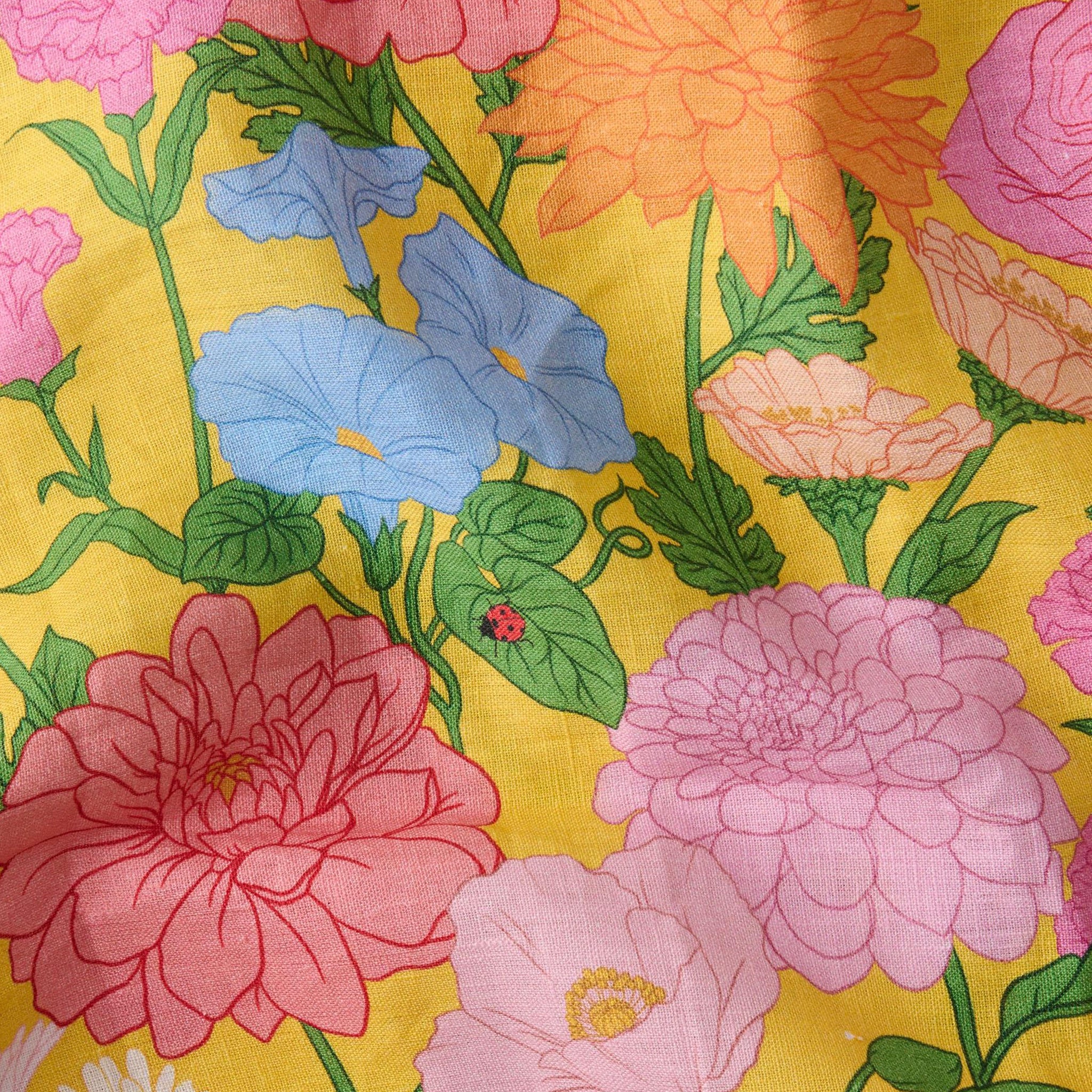 Kip & Co floral-patterned napkins on a tablecloth