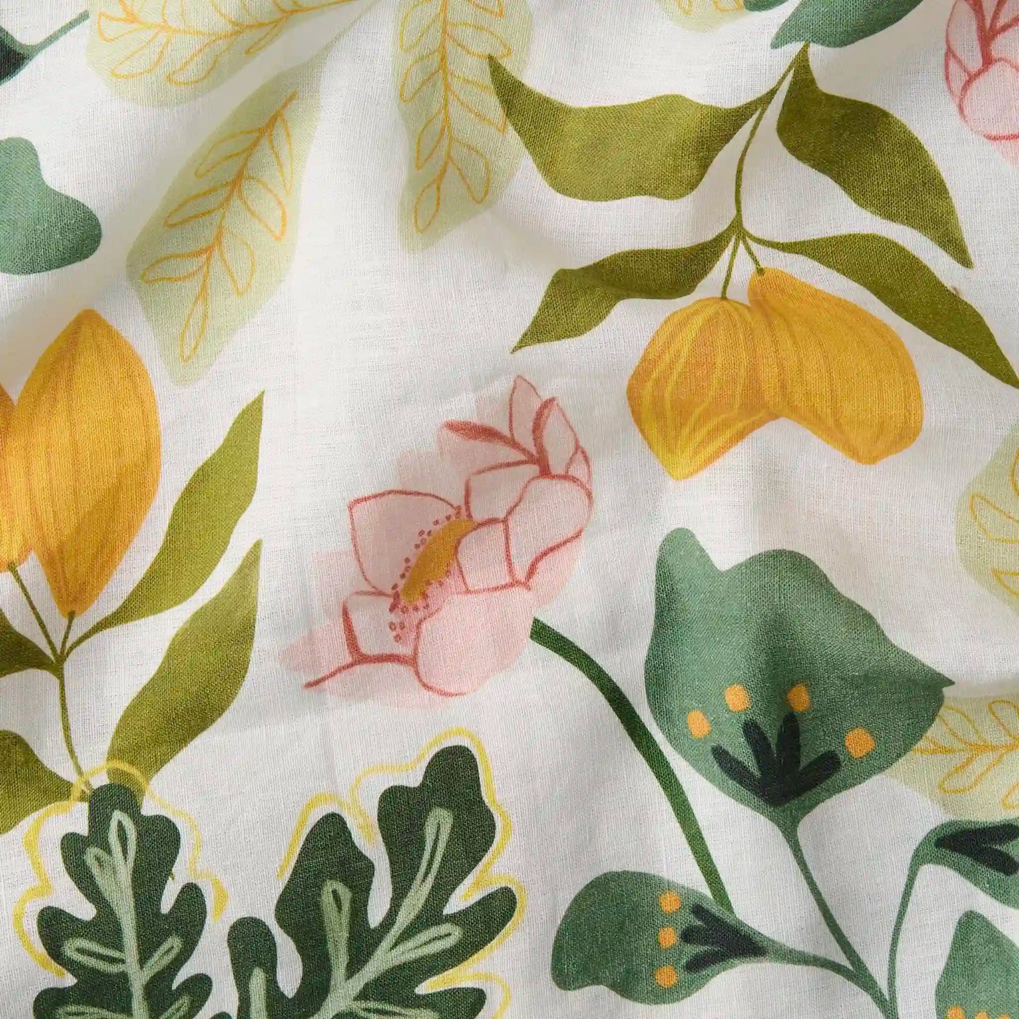 Floral and leaf pattern on a white tablecloth