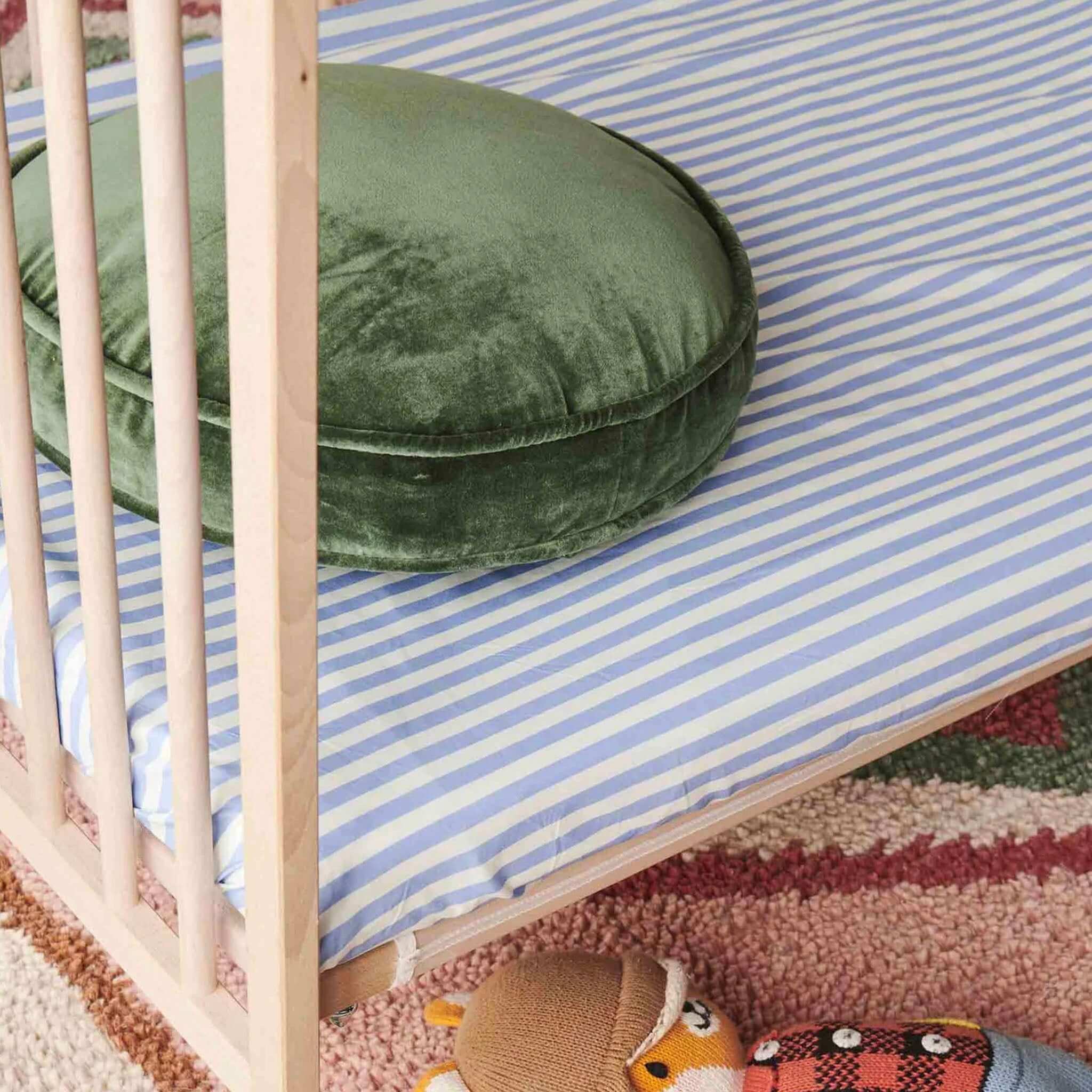 Kip & Co Organic Cotton Baby Fitted Cot Sheet - Seaside Stripe on cot mattress with blue and white stripes, soft organic cotton