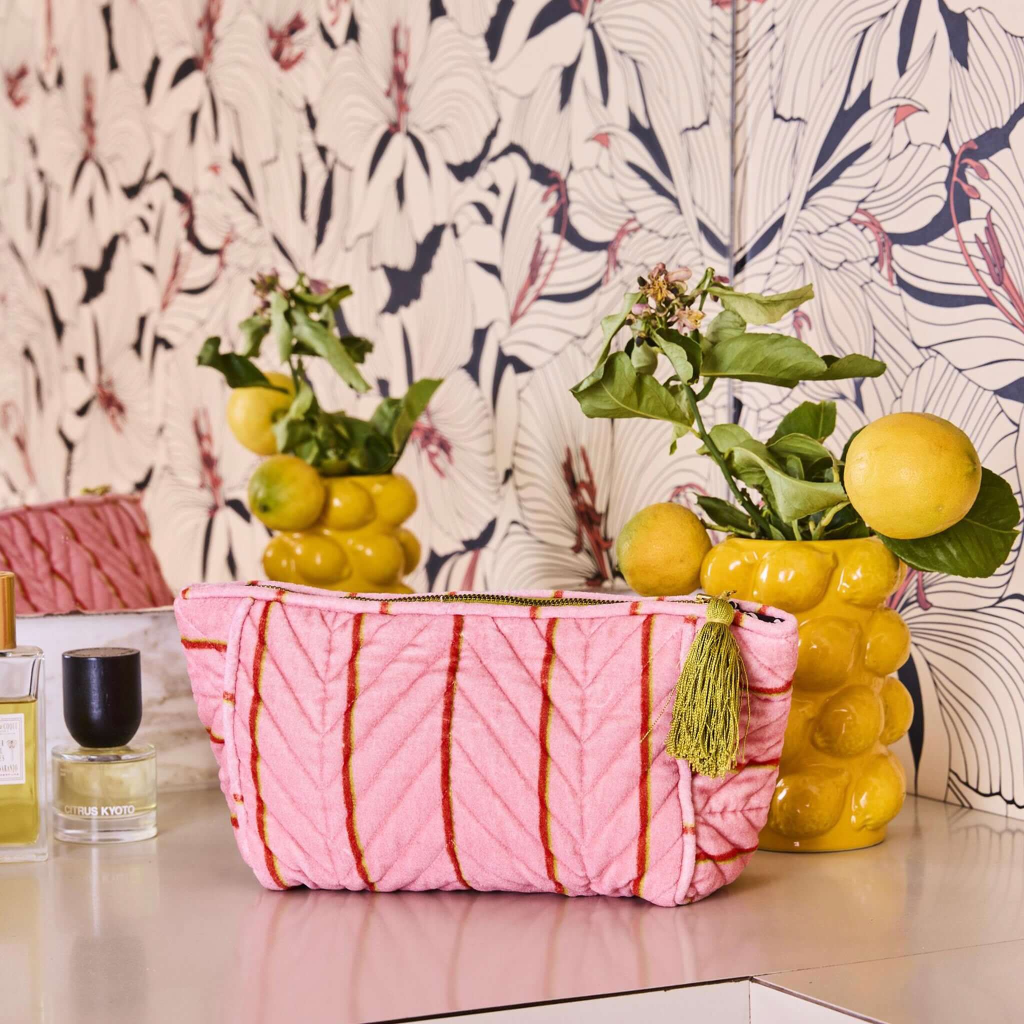 Alt Tag: Kip & Co Velvet Toiletry Bag - Wategos Soiree Stripe pink velvet cosmetic bag with red stripe and lime green tassel