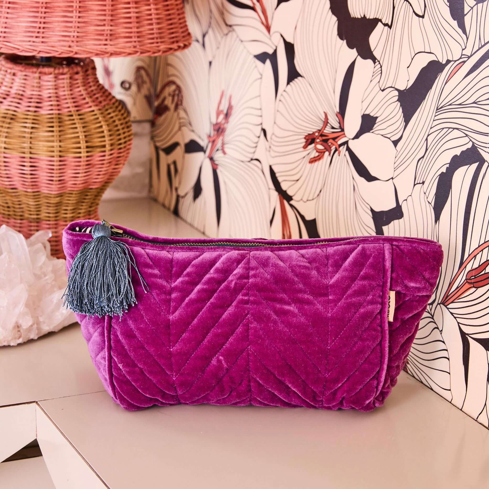 Alt Tag: Kip & Co Velvet Toiletry Bag - Wild Grape deep grape cotton velvet cosmetic bag with blue tassel and zip closure
