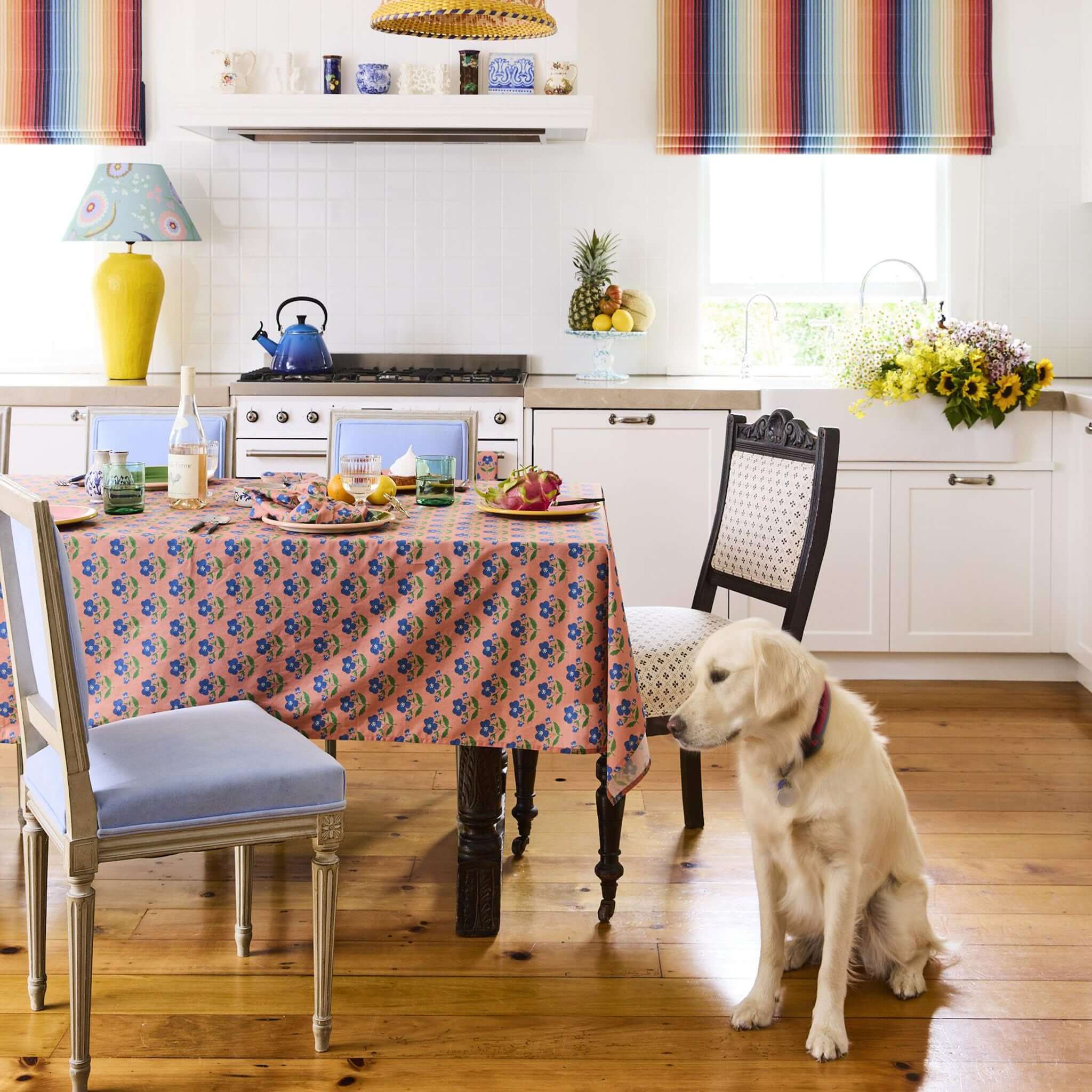 Kip & Co x Anna Spiro  Linen & Cotton Tablecloth - Indian Summer Rose set on a dining table in a bright kitchen.