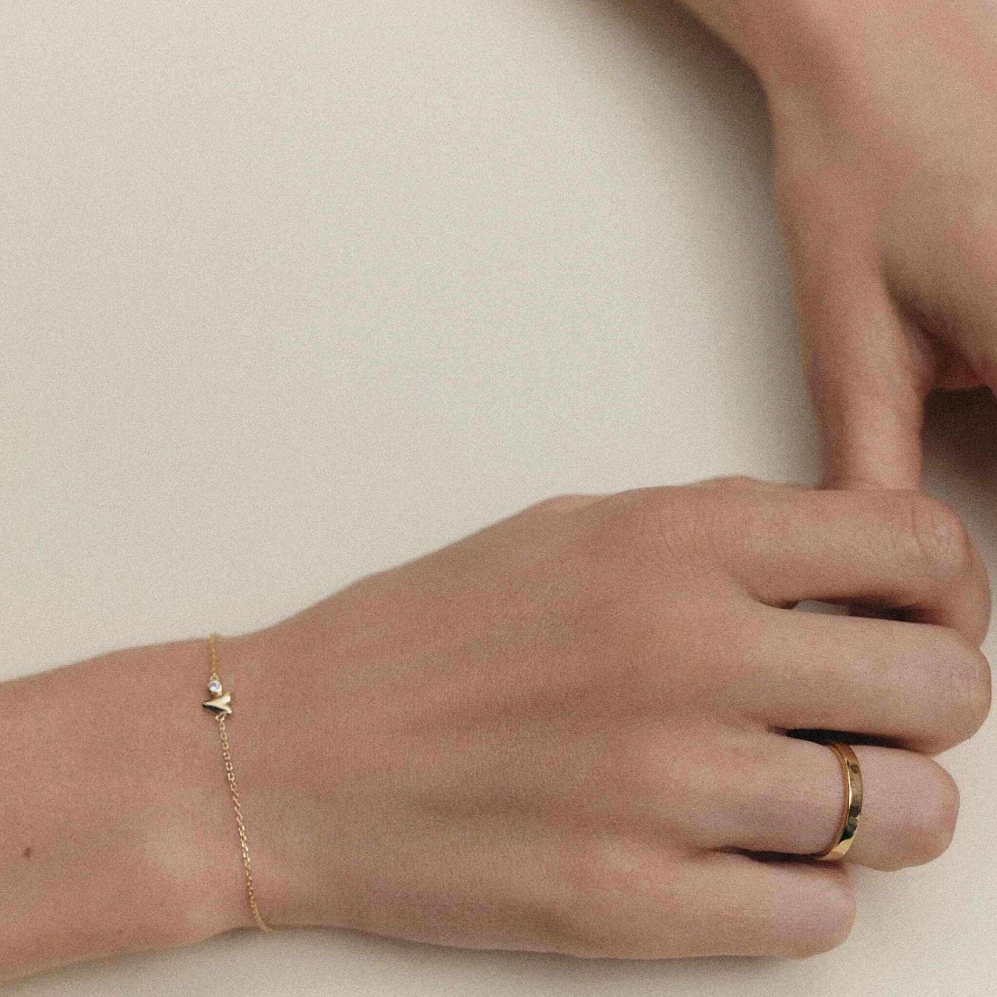 Kirstin Ash Vista Collection Abode Heart Bracelet in 18k gold-plated, organic heart with white topaz on fine chain bracelet