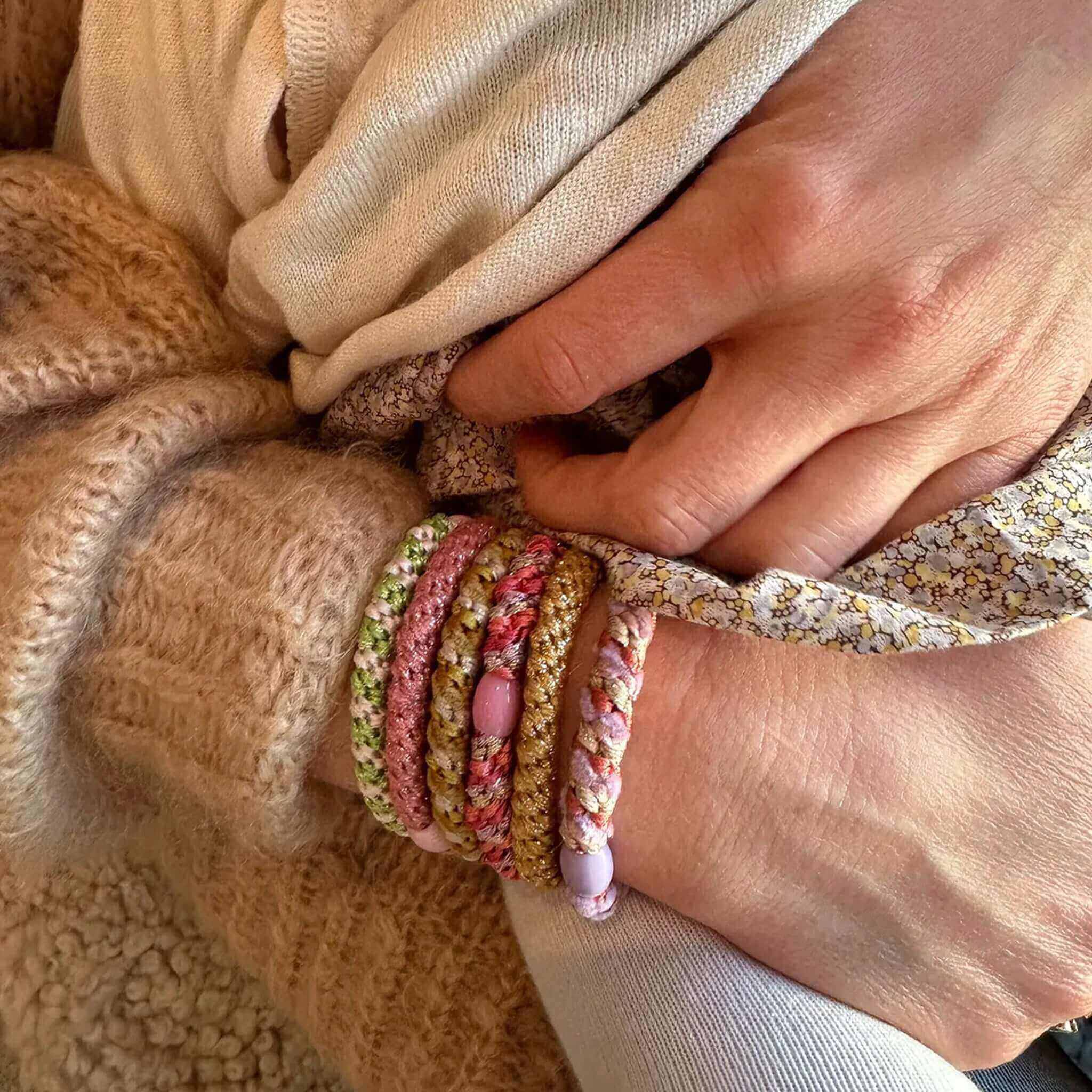 Alt Tag: Kknekki Hair Tie - Peppermint Faded Rose Mix woven hair ties stacked on wrist, waterproof no-damage hold with recycled bead